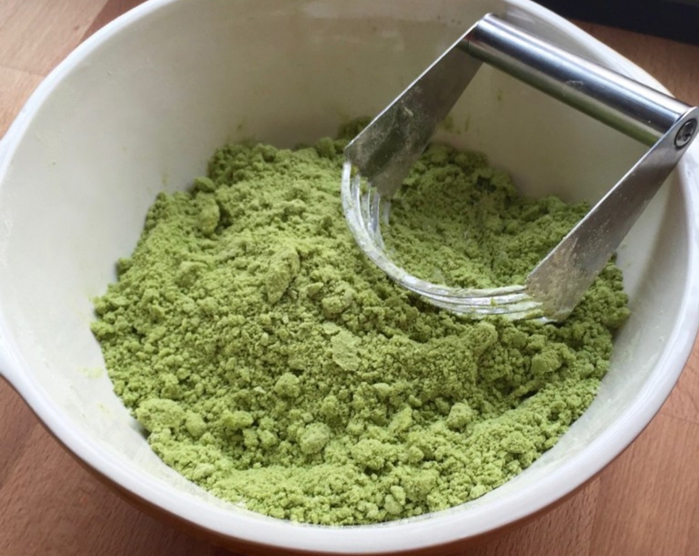 step 6 Using a pastry cutter, cut the butter into the flour mixture until it resembles coarse crumbs.