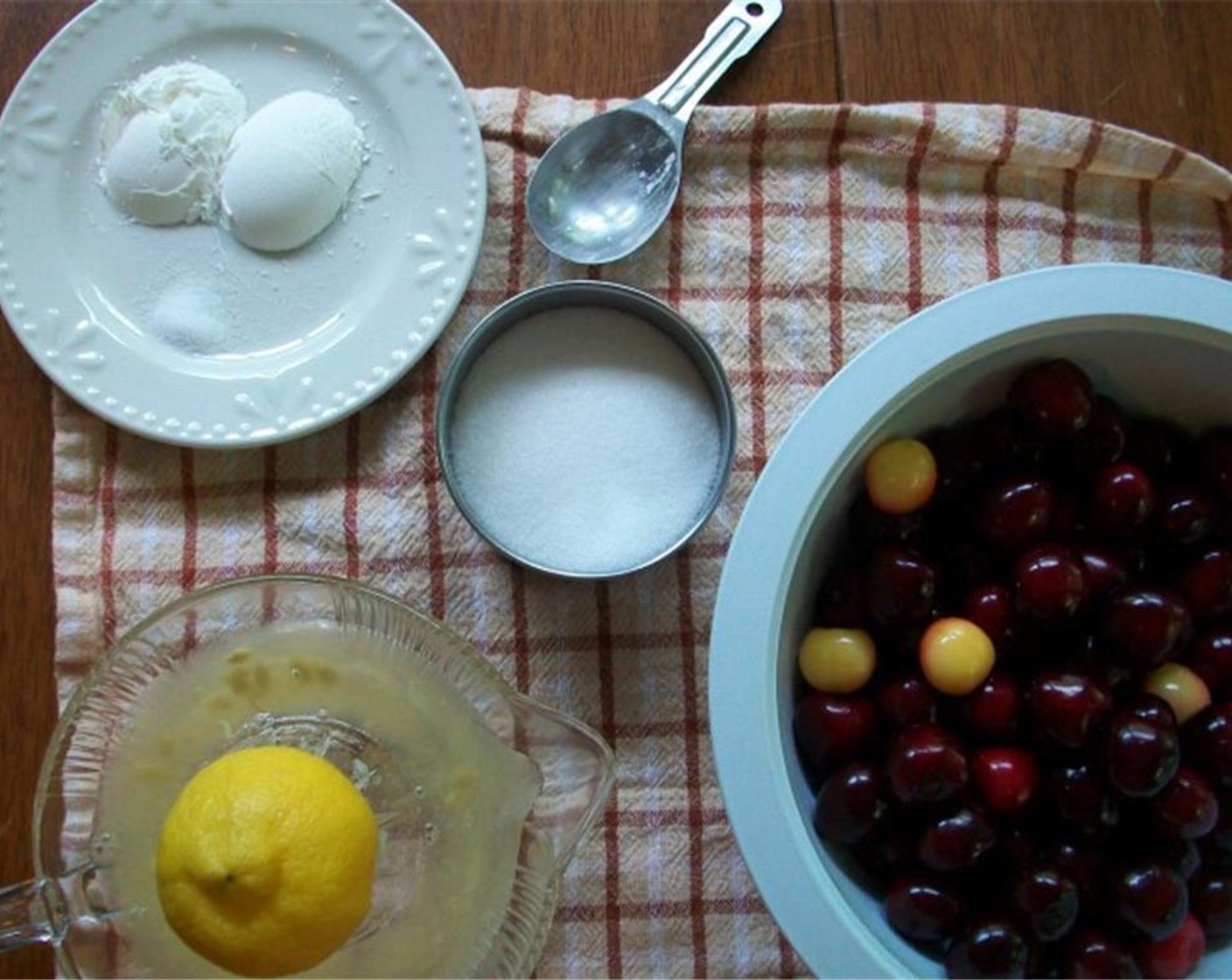 step 2 Pit and slice the Cherries (4 cups) in half. Combine the cherries, Corn Starch (2 Tbsp), juice from Lemon (1), Granulated Sugar (1/2 cup), and Salt (1 pinch) in a bowl.