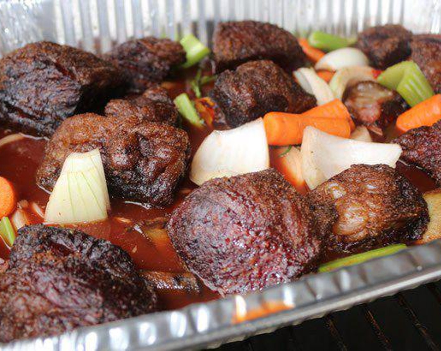 step 5 When the short ribs are brown (approx. 3 hrs) place them in the pan with the liquid.