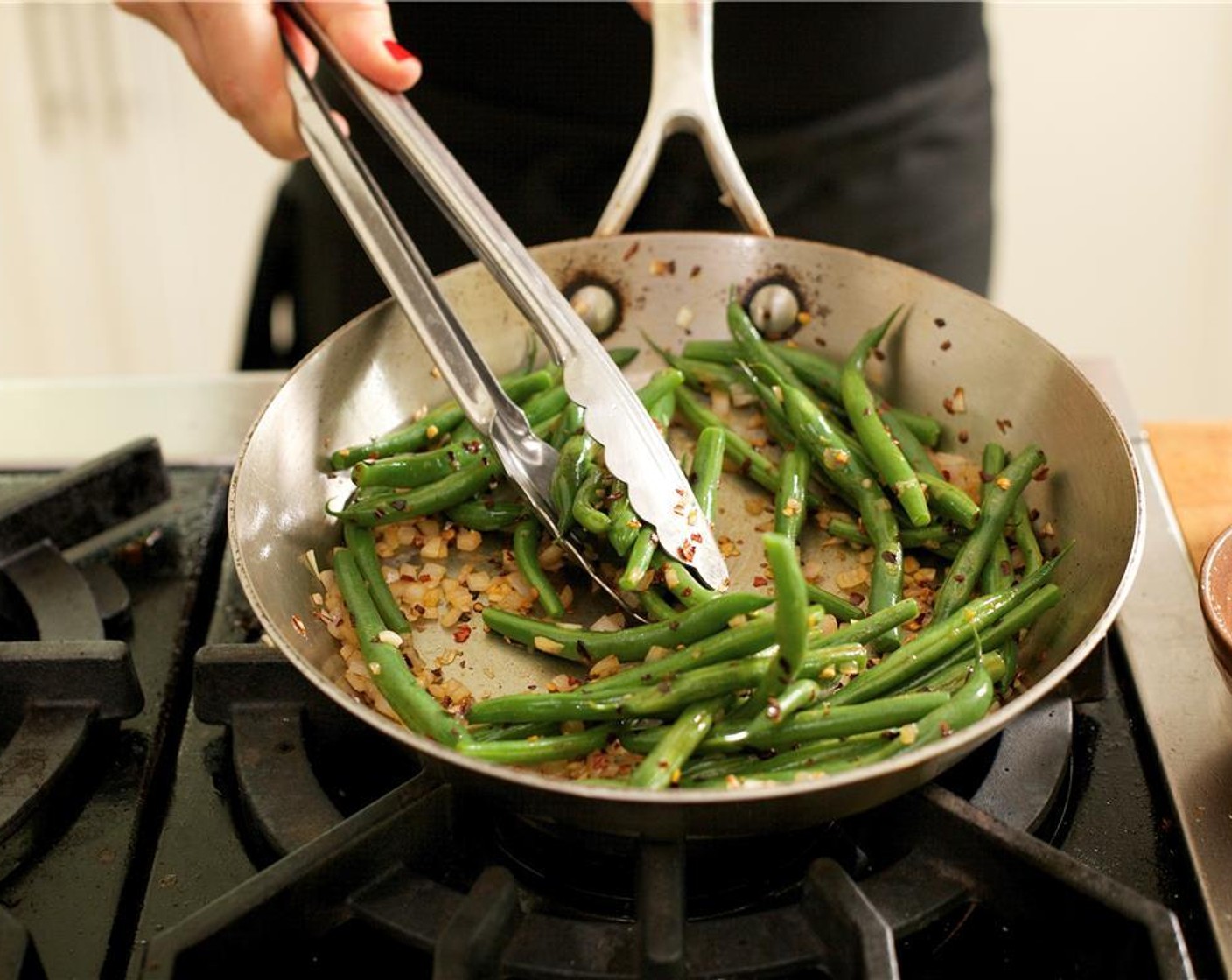 step 21 Trim off the ends of Green Beans (1 1/2 cups) and add to the water once boiling.