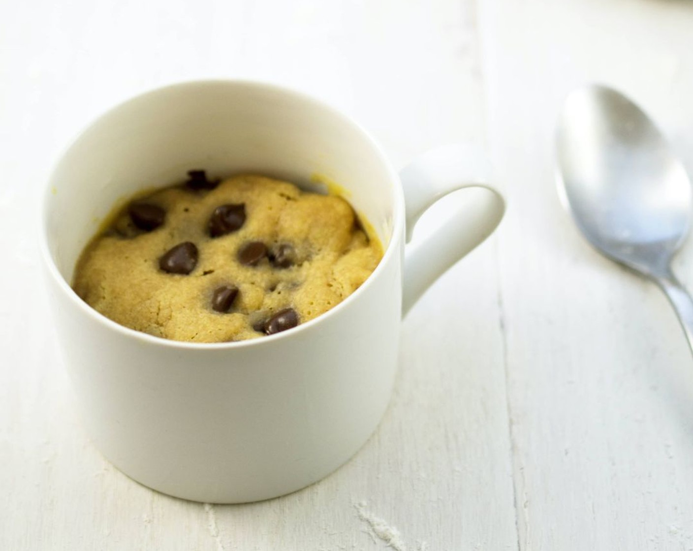 step 7 Let stand for 2 minutes (the cookie will continue to cook as it cools). Top with ice cream and watch it melt into your cookie. Now grab a spoon and dig in!