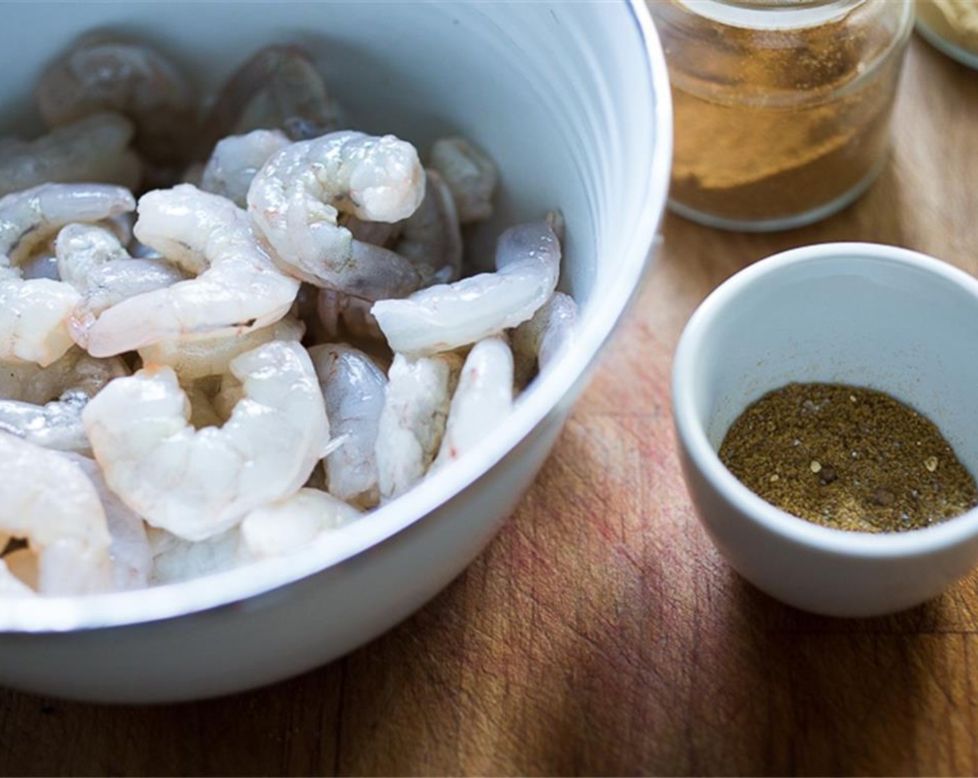 step 1 Thaw, peel and devein the Large Shrimp (1 lb). Pat dry shrimp really well. Drizzle with just enough Oil (1/2 Tbsp) to lightly coat, about 1 to 2 teaspoons.