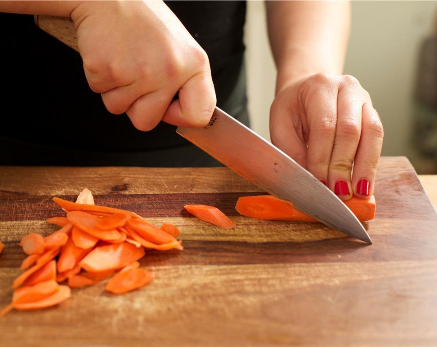 step 1 Peel and mince the Fresh Ginger (2 Tbsp) and place in a medium saute pan. Mince the Garlic (2 cloves) and set in the medium saute pan. Slice the Scallion (1 bunch) diagonally; set aside for garnish. Chop the Shallot (1) and set aside. Peel the Carrots (3) and slice thinly at a diagonal angle; set aside.