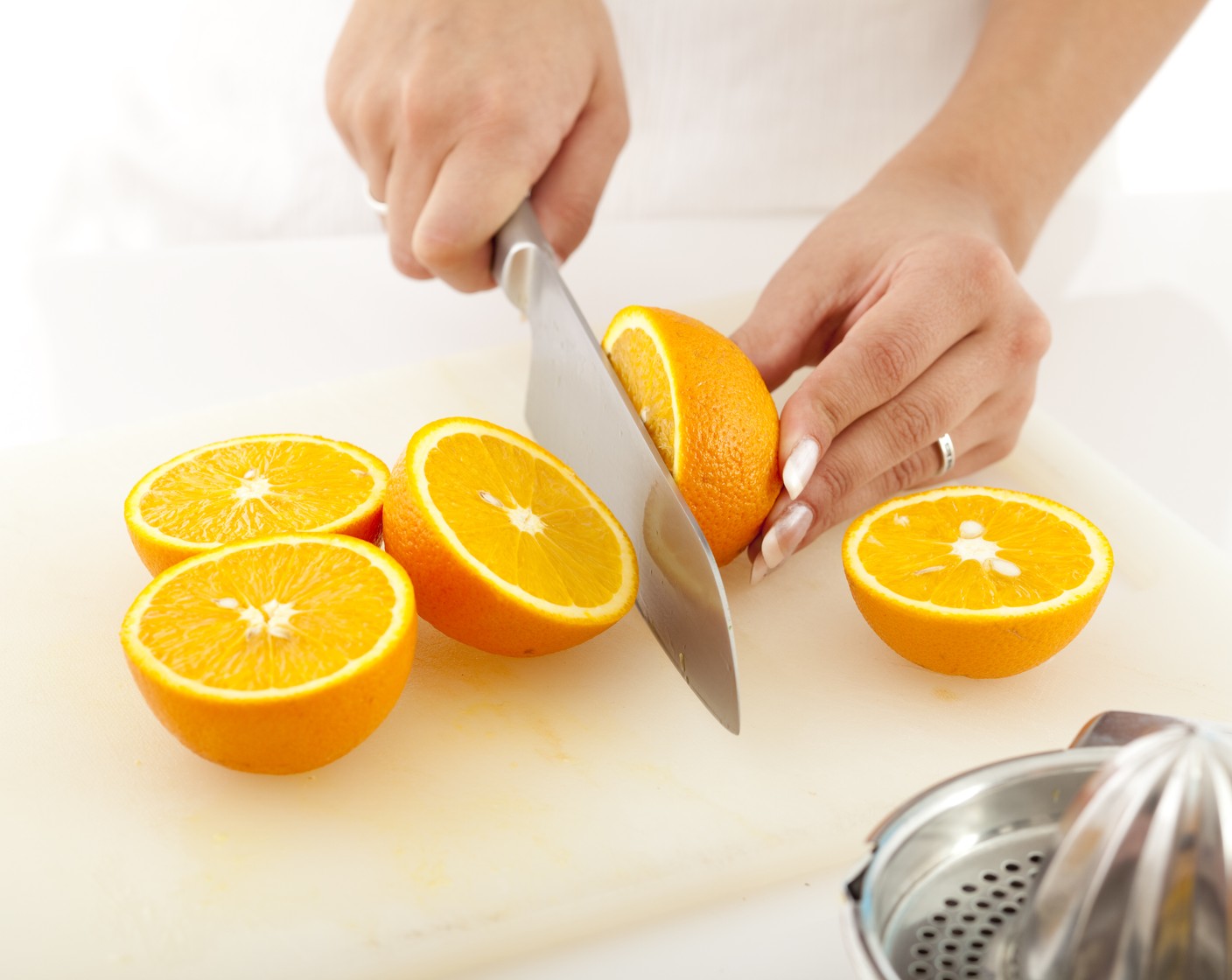 step 2 Slice Navel Oranges (3) in half and use a paring knife and spoon to remove flesh and white pith being careful not to tear them. Place orange halves in a casserole dish.