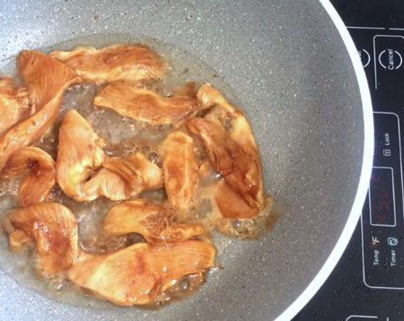 step 2 Add some Vegetable Oil (1/4 cup) to a cooking pan, and stir fry the chicken pieces for about 4-5 minutes.