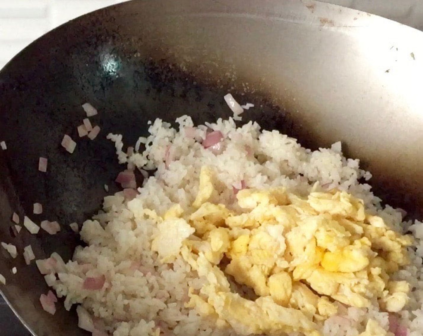 step 11 Then, add in the scrambled eggs.