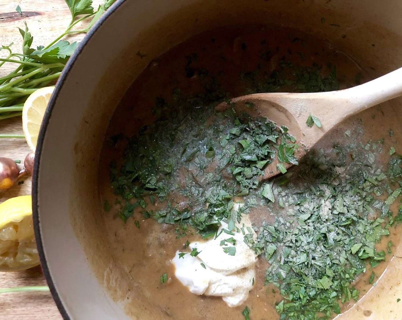 step 6 Finally, stir in the Salt (1 tsp), Ground Black Pepper (1/4 tsp), juice of the Lemon (1/2), Fresh Parsley (1/4 cup), and Sour Cream (1/2 cup). Mix well and allow to heat through over low heat, about 3 to 5 minutes. Do not boil.