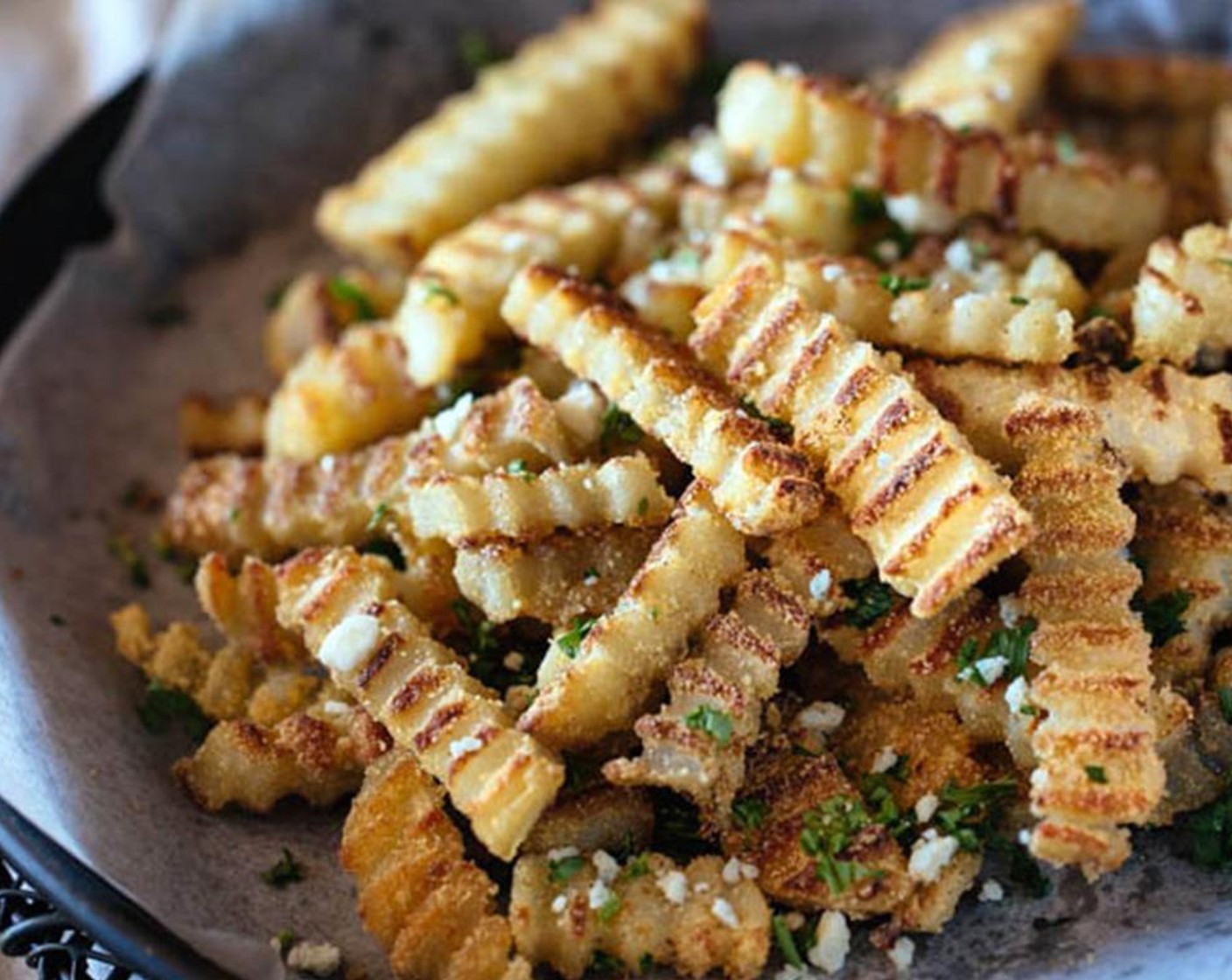 step 7 Transfer them to a large plate; sprinkle with Fresh Parsley (2 Tbsp) and crumbled Gorgonzola Cheese (2 Tbsp). Serve immediately.