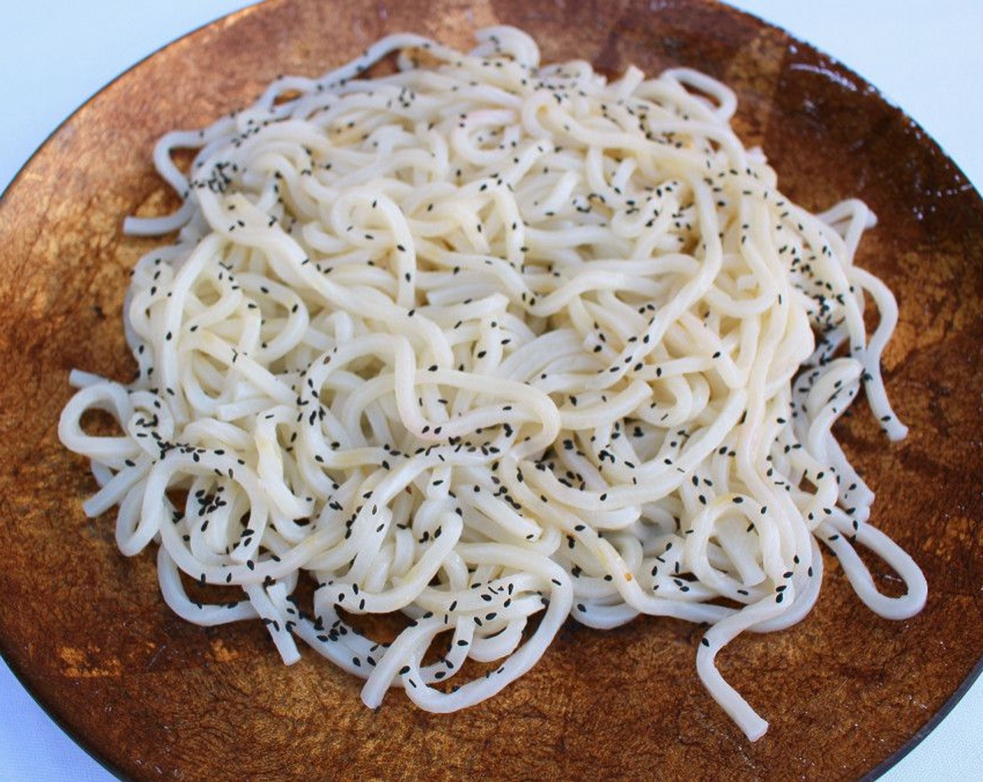 step 10 Sprinkle noodles with Black Sesame Seeds (to taste).