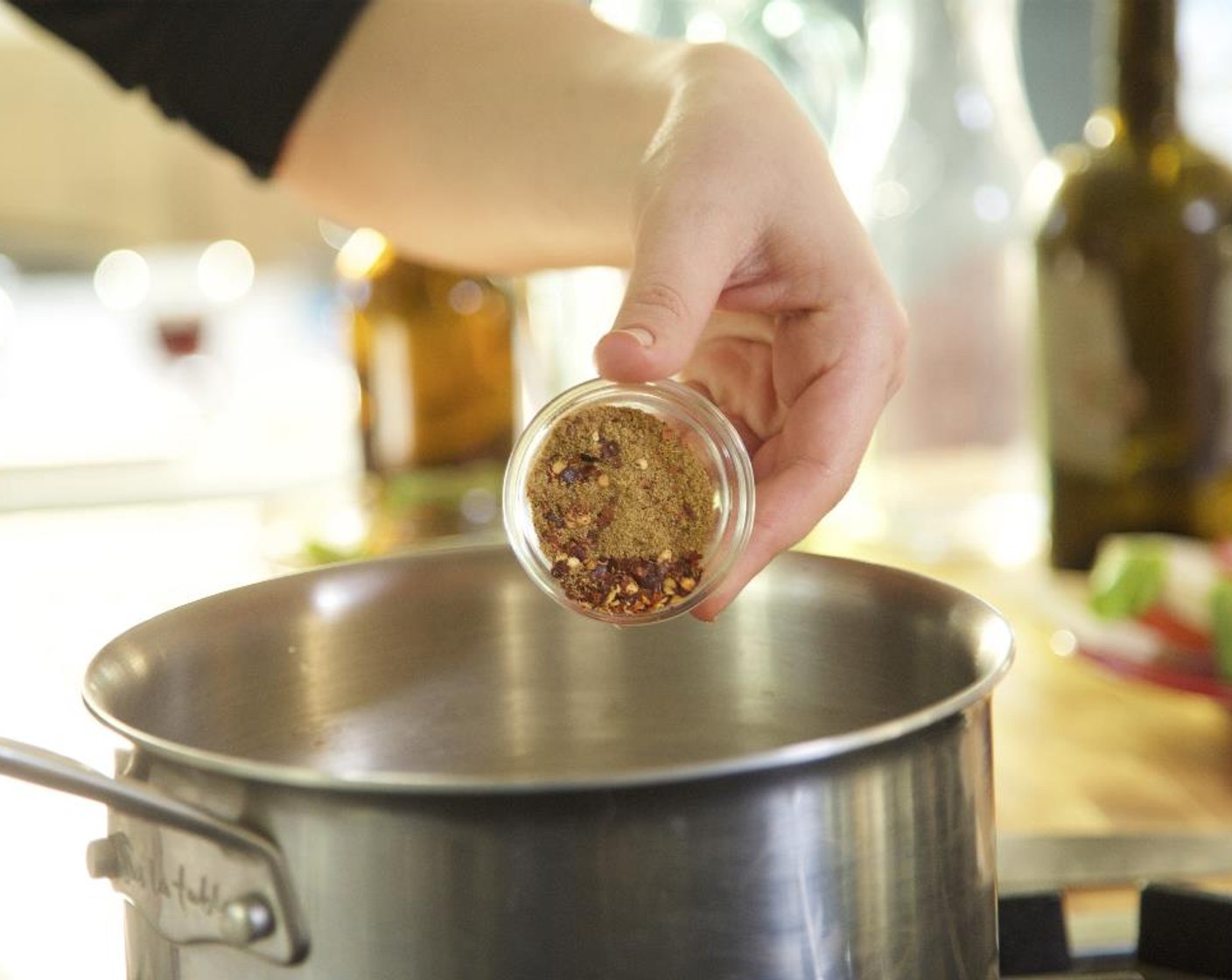 step 11 Once the rice and lentils come to a boil, reduce heat to low and add the Ground Turmeric (1 tsp), Ground Cumin (1 tsp), Crushed Red Pepper Flakes (1/4 tsp), and garlic. Stir to combine. Simmer, covered, for 35 minutes.