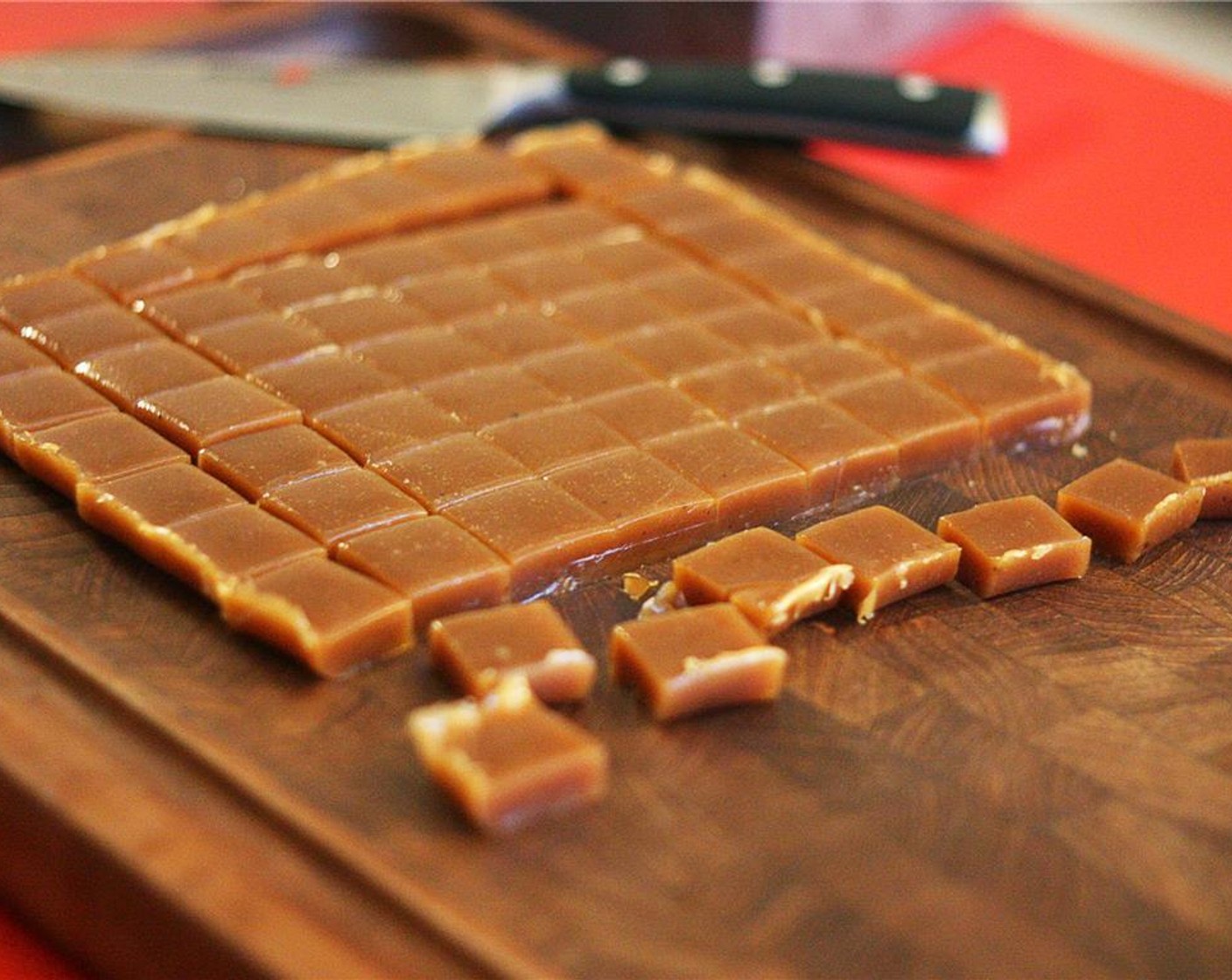 step 8 Turn the strips 90 degrees and make perpendicular cuts, essentially cutting the caramels into 1-inch squares.