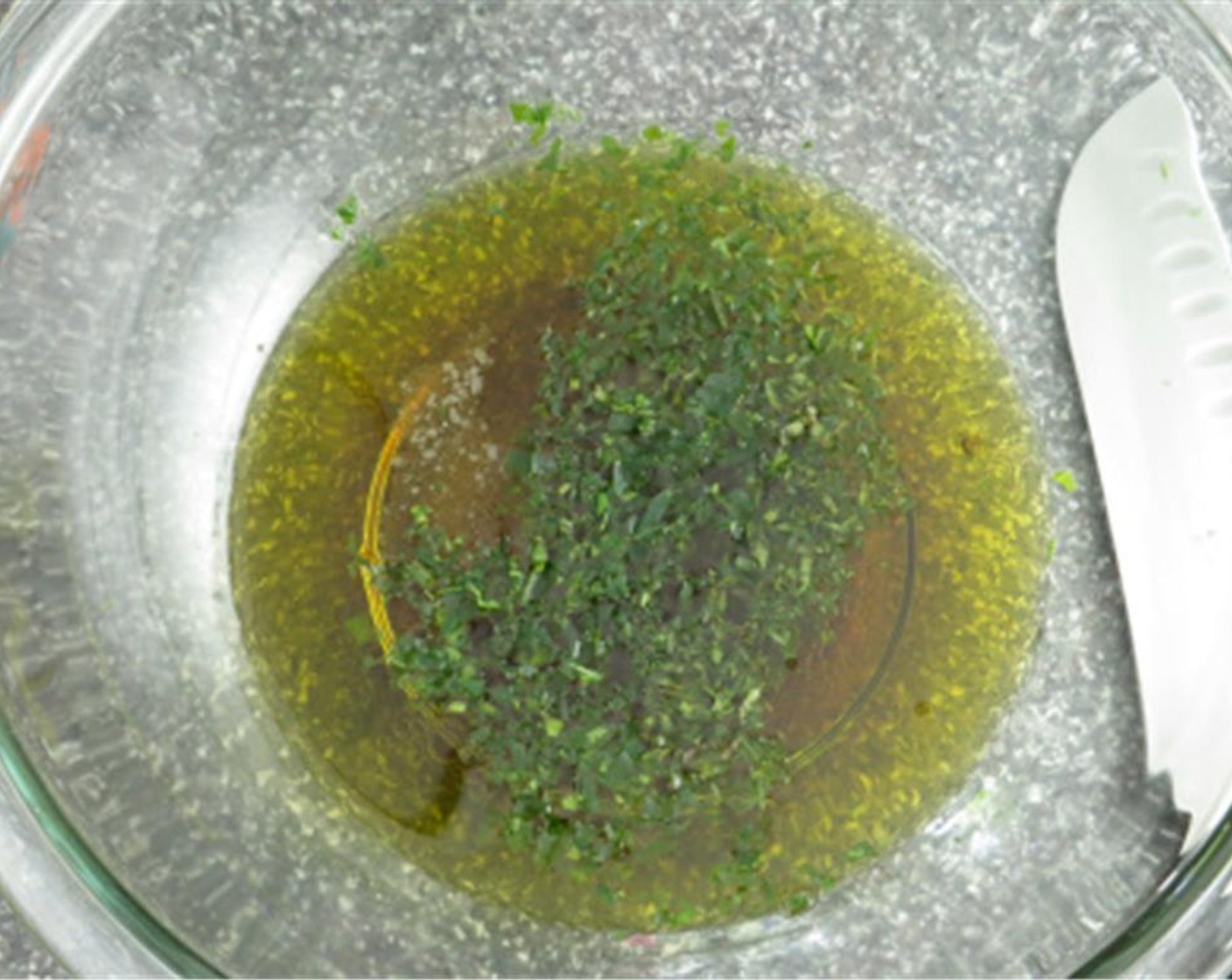 step 3 In a large bowl, add Champagne Vinegar (3 Tbsp), Malt Vinegar (3 Tbsp), Extra-Virgin Olive Oil (1/2 cup), tarragon, fresh thyme, Ground Black Pepper (1 tsp), and Fine Sea Salt (1 tsp).