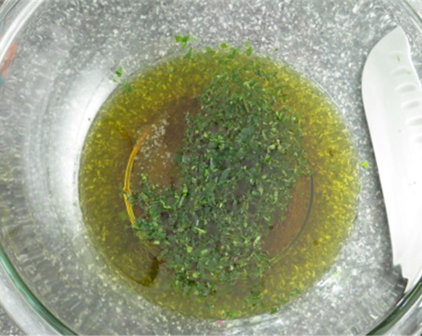 step 3 In a large bowl, add Champagne Vinegar (3 Tbsp), Malt Vinegar (3 Tbsp), Extra-Virgin Olive Oil (1/2 cup), tarragon, fresh thyme, Ground Black Pepper (1 1/4 tsp), and Fine Sea Salt (1 tsp).