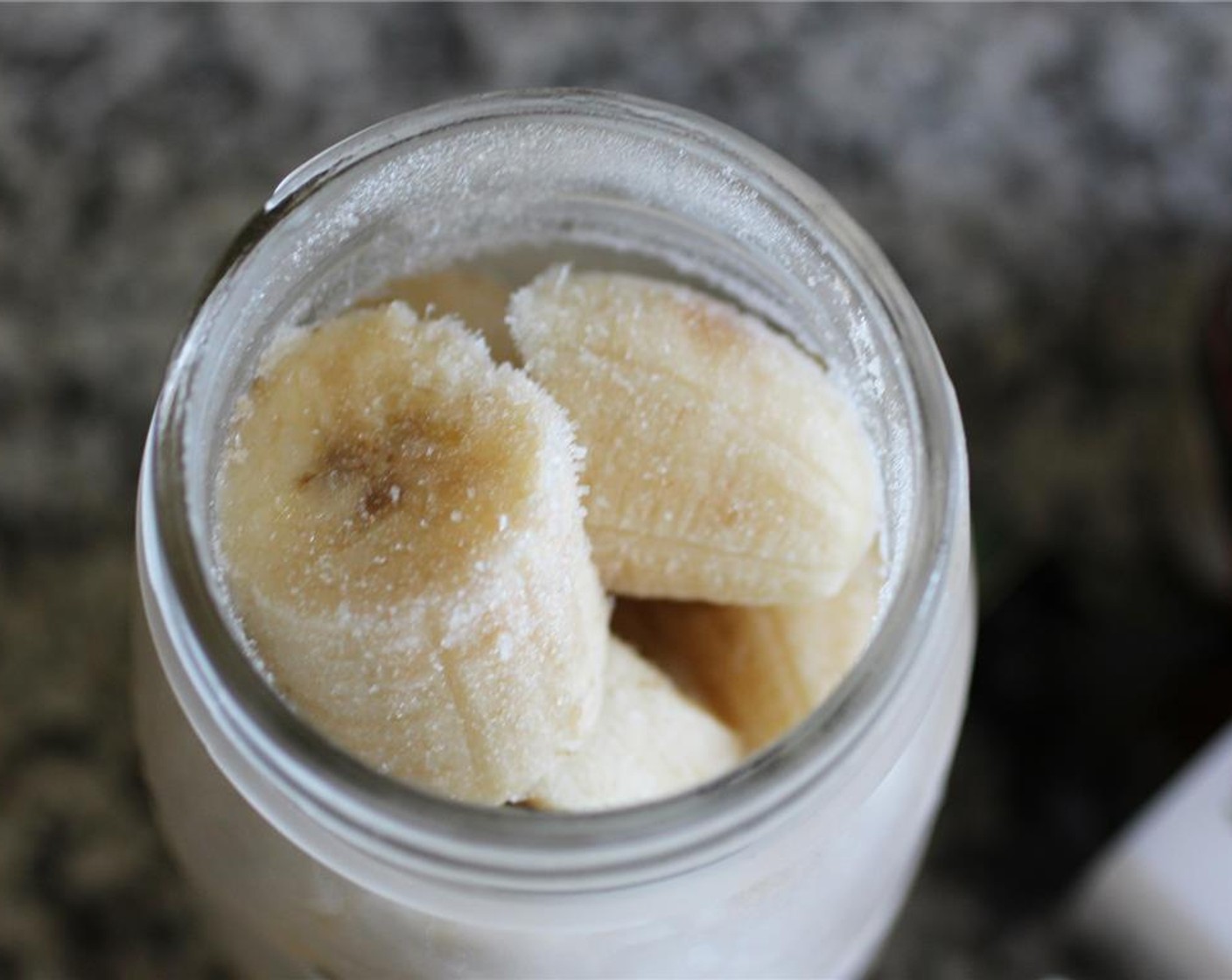 step 1 Start by peeling and freezing your Bananas (2) the night before. It’s easiest to cut them a bit before freezing. I find a mason jar works wonders to store them in.