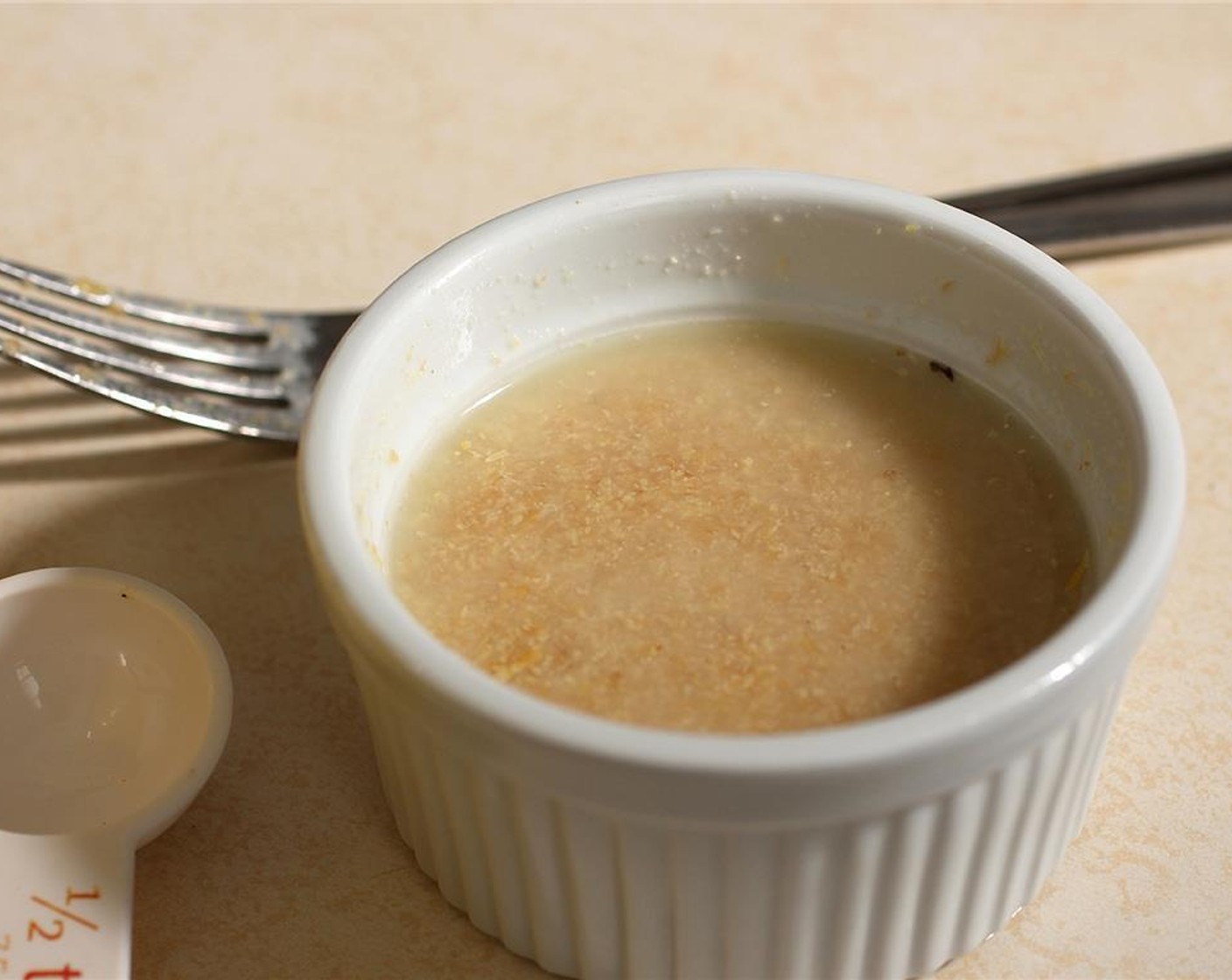 step 2 Make your flax egg by mixing the Ground Flaxseed (2 Tbsp) with Water (1/4 cup) in a small bowl or ramekin. Place in the fridge to cool for 10-15 minutes.