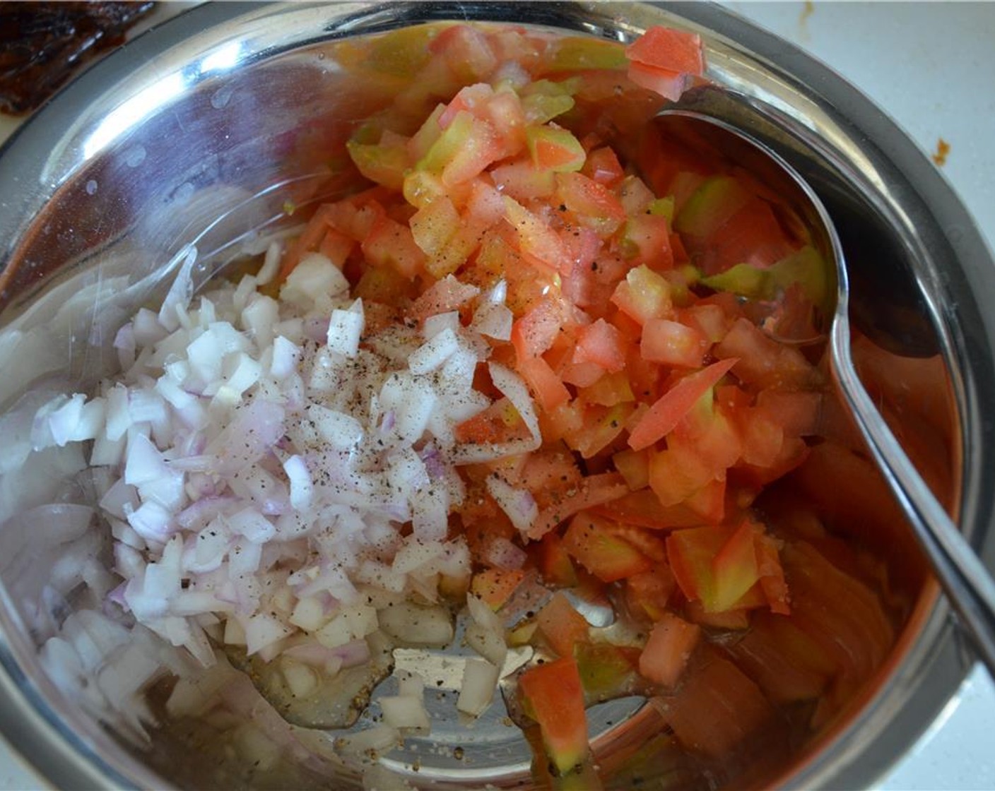 step 8 Mix and combine the diced red onion, tomato and salted egg. Sprinkle with some Salt (to taste) and Ground Black Pepper (to taste). Set aside.