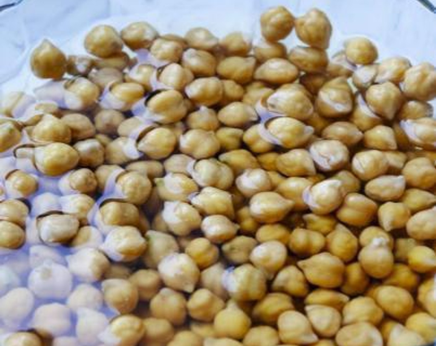 step 1 Start off by rinsing the Dried Chickpeas (1 1/4 cups) under clean filtered water. Place them in a bowl, cover with Salt (to taste) and let them soak for 8-12 hours or overnight