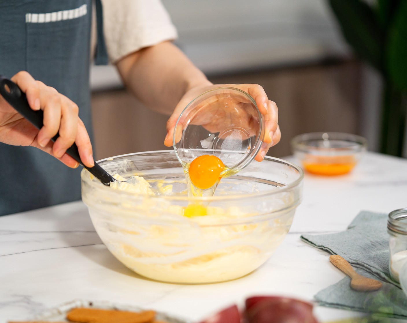 step 6 Add 2 whole Eggland's Best Classic Eggs (4) and 2 egg yolks, one at a time. Mix until just combined.