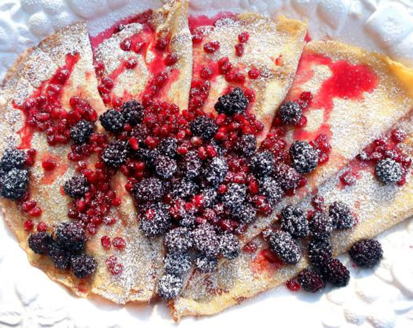 Vanilla Crepes with Caramelized Blackberries and Pomegranate Seeds