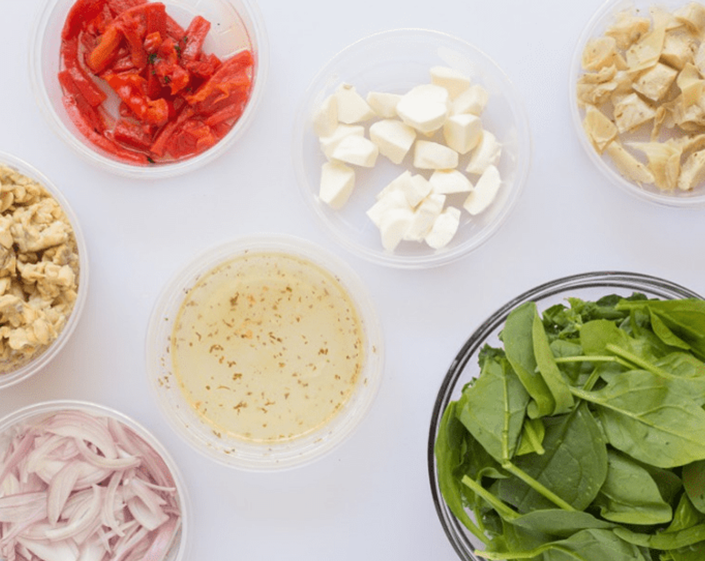 step 3 Prepare your mise en place: Crumble Tempeh (1 1/3 cups). Peel and thinly slice Shallot (1/3 cup). Cut or tear Leafy Greens (2 3/4 cups) into bite-size pieces. Remove Artichoke Hearts (1/2 cup) from the jar, and reserve liquid.