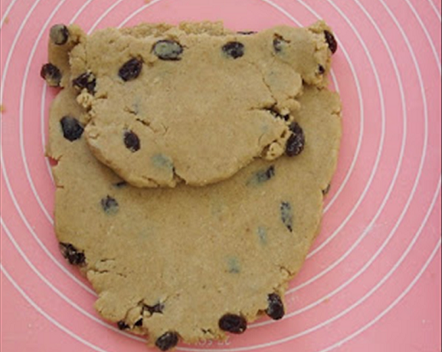 step 7 Remove dough from the fridge. Turn it onto a lightly floured surface and roll it into a rectangle about ½ inch thick. Fold it into thirds like a letter. Repeat another time the same way. Roll the dough out to at least 1 inch (2.5cm) thick. Please do not roll it any thinner as we want to have well-risen scones.