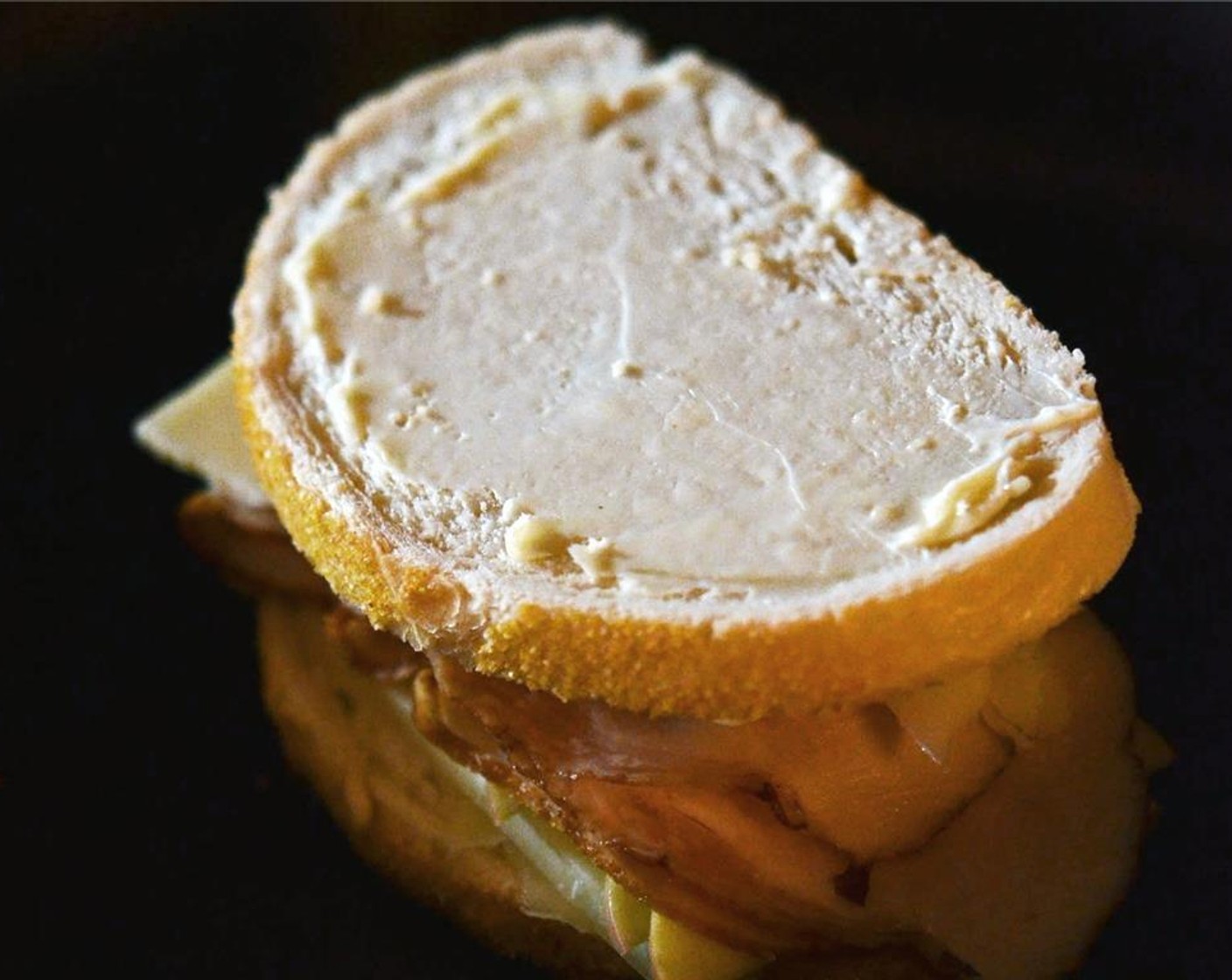 step 7 Slather remaining slice of bread with remaining Ranch Dressing (1 Tbsp) and place on top of the cheese, ranch side down, and butter side up.