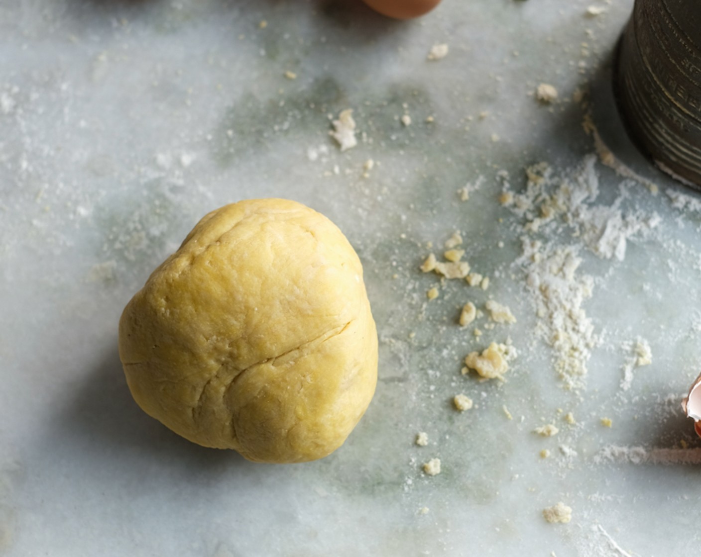 step 3 Dust the work surface with Fine Semolina Flour (as needed) and knead the dough until it is smooth and elastic. Wrap the dough in clingfilm and leave to rest for half an hour.