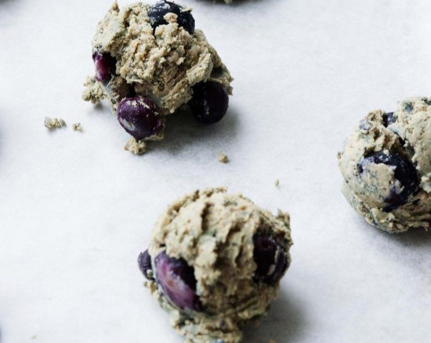 step 5 Drop tablespoons of dough onto a parchment paper. Bake for 10 minutes in preheated oven.