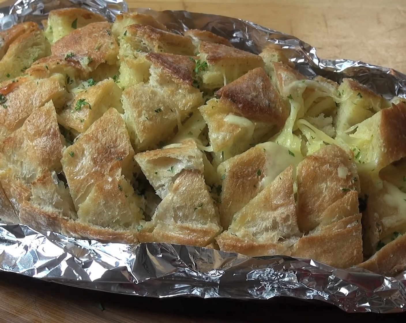 step 7 Open the foil and allow the bread to toast for another 5 minutes or until crispy and golden outside. Serve immediately or keep wrapped up in the foil until ready to serve.