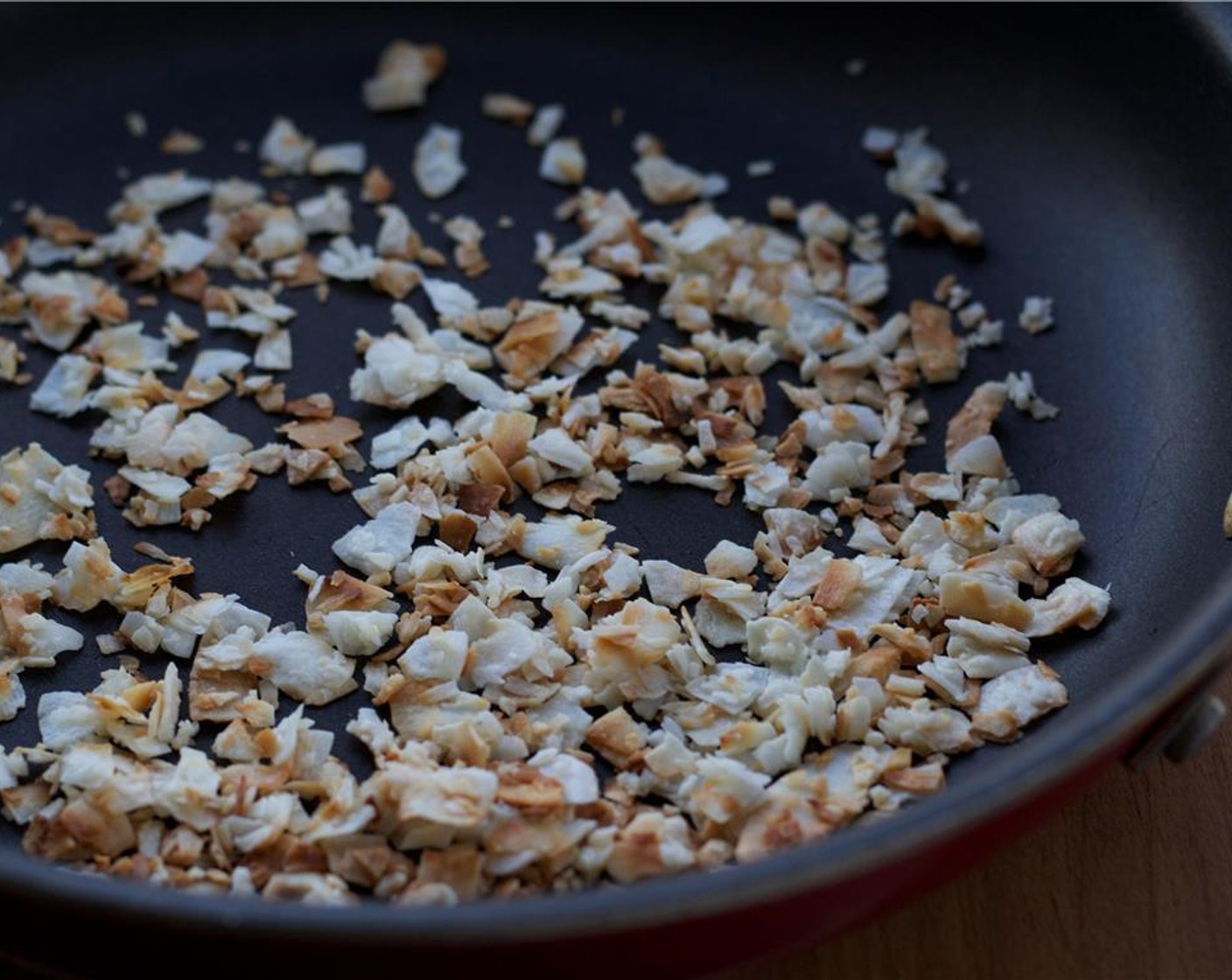 step 5 Heat a skillet over low heat. Toast the Unsweetened Coconut Flakes (1/4 cup) for a few minutes until golden brown, stirring frequently.