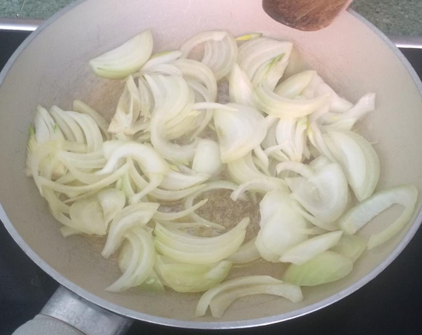 step 1 Saute the Onion (1) and Garlic (1 clove) in a large pan with Oil (as needed) and Butter (to taste) until they have softened and caramelized, for about 20 minutes.