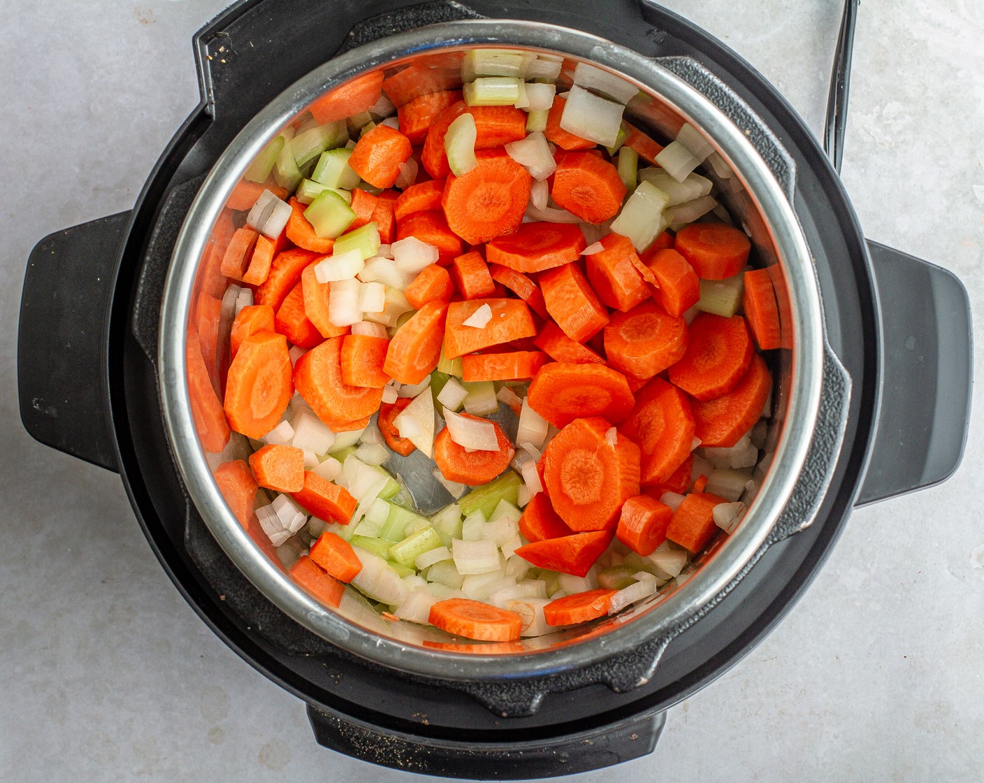 step 2 Stir in All-Purpose Flour (1 Tbsp), Italian Seasoning (1/2 Tbsp), Cajun Seasoning (1/2 Tbsp), Ground Black Pepper (1 tsp), and Bay Leaf (1) and cook for 2 minutes.