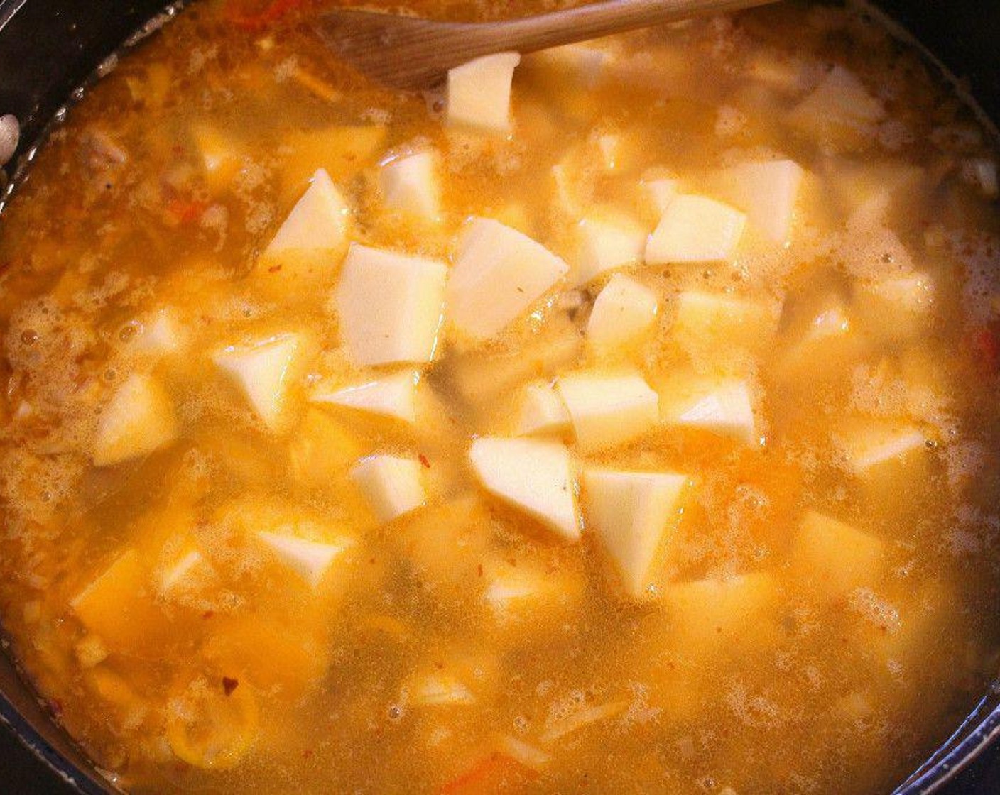 step 8 Add cubed potato, simmer until potatoes are nearly soft, add Tomato Paste (1/2 cup), Garlic Paste (1 Tbsp), Dried Thyme (1 Tbsp),  Dried Oregano (1 Tbsp), Salt (to taste) and Ground Black Pepper (to taste).