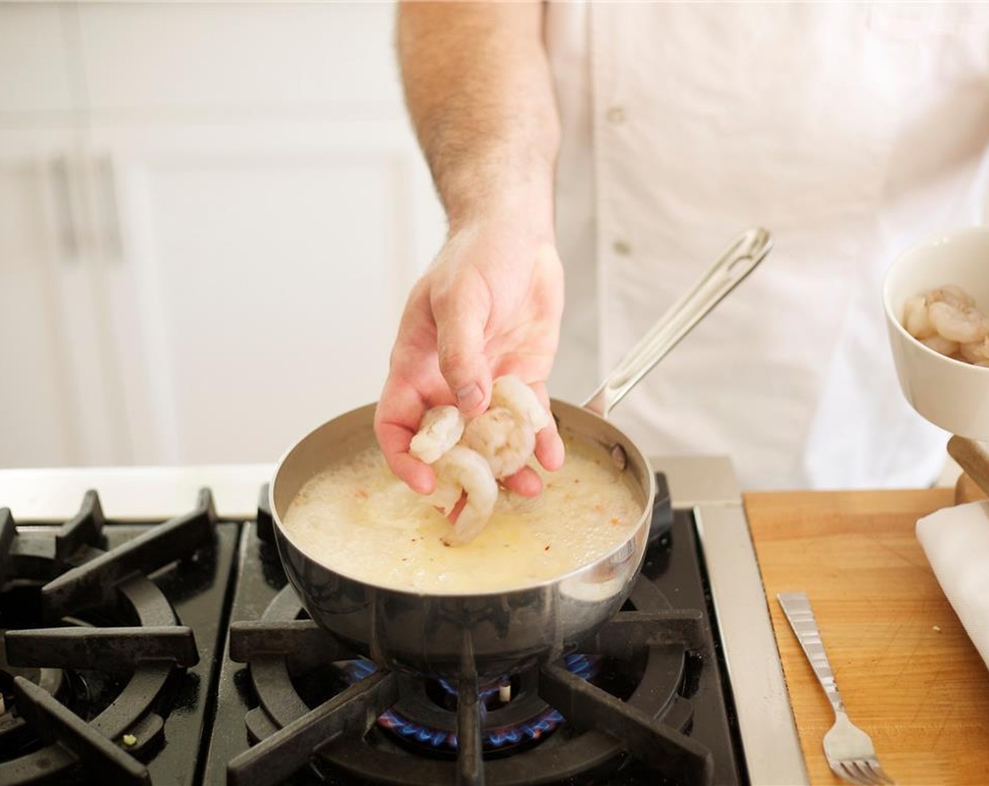 step 6 Add Shrimp (20), stir, and cook until opaque, about two minutes.