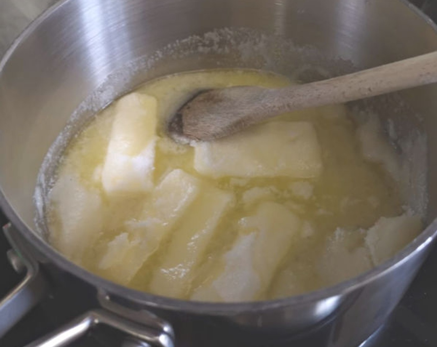 step 3 Carefully bring the Butter (1 cup) and Granulated Sugar (1 cup) to a boil. Gently simmer for 2 minutes.