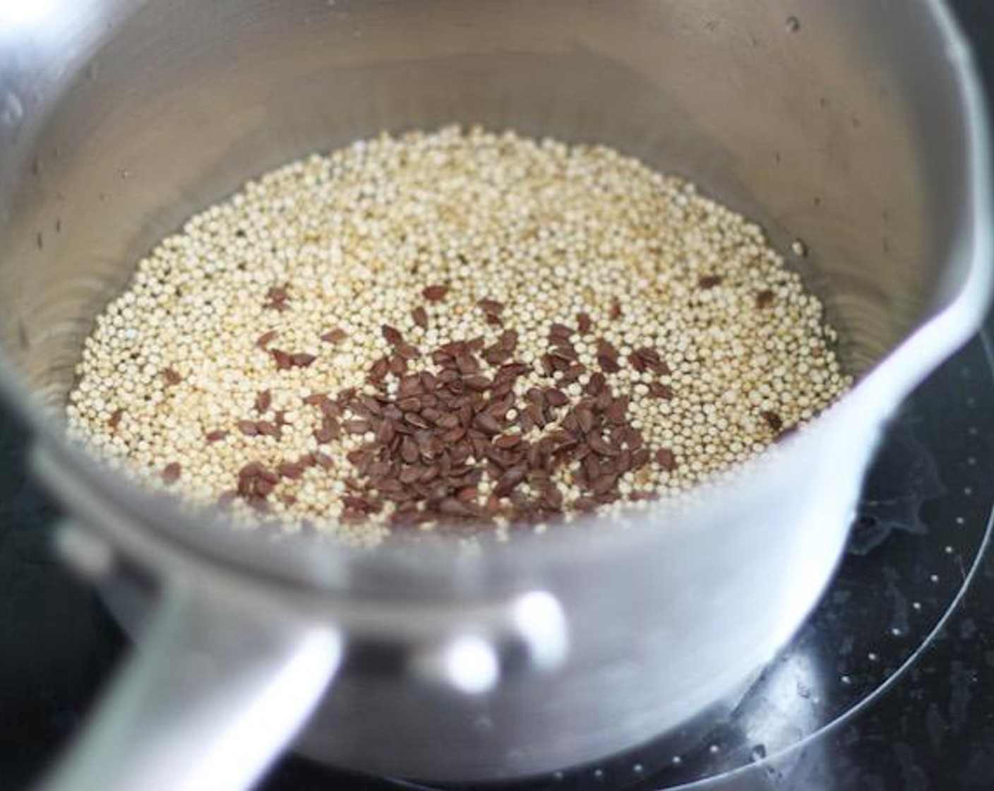 step 1 Put Quinoa (1/2 cup), Flaxseeds (2 Tbsp) and one cup water into a small pot and cook until they become soft. It usually takes about 20-30 minutes.