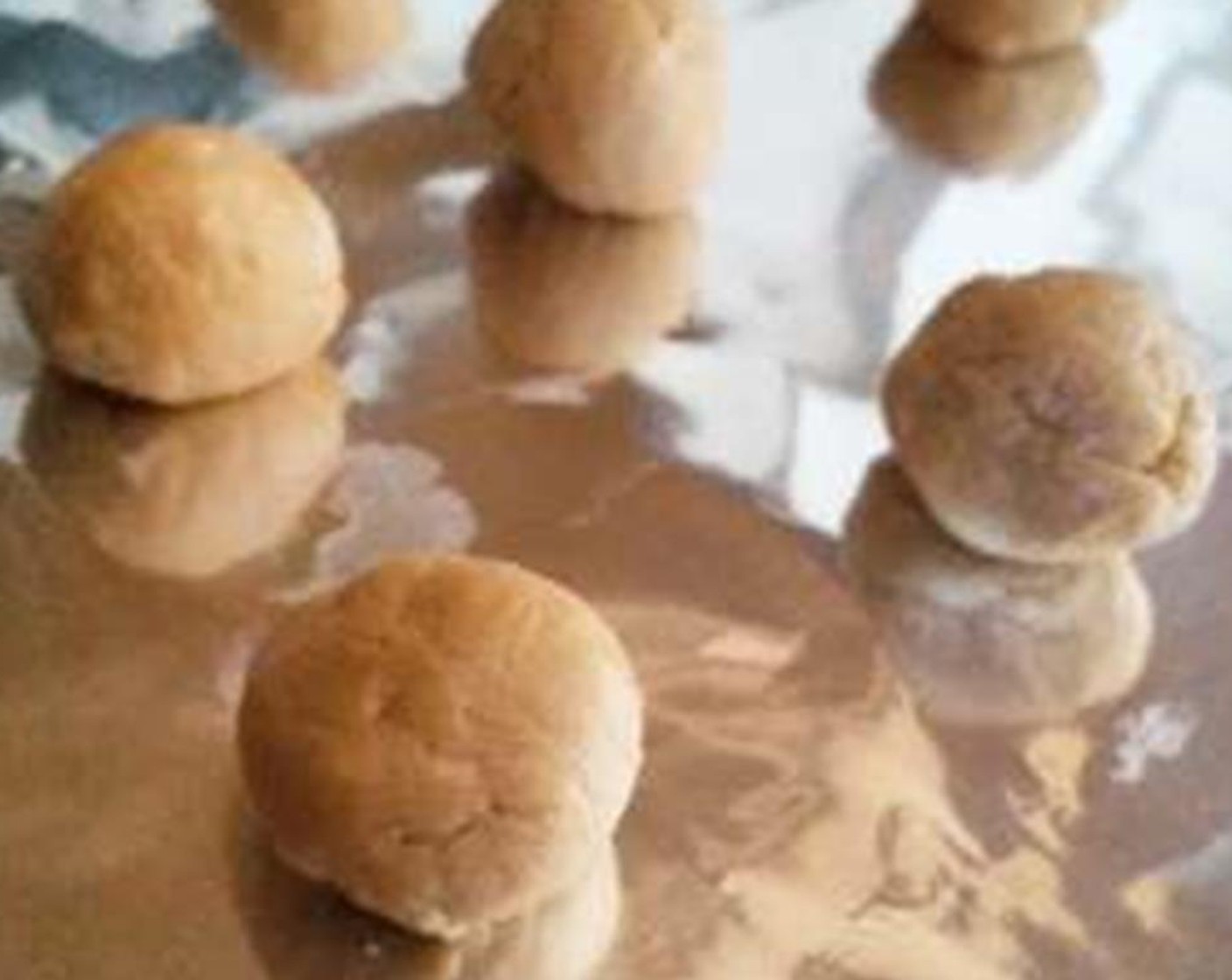 step 2 Roll peanut butter mixture into 12 evenly-sized balls.