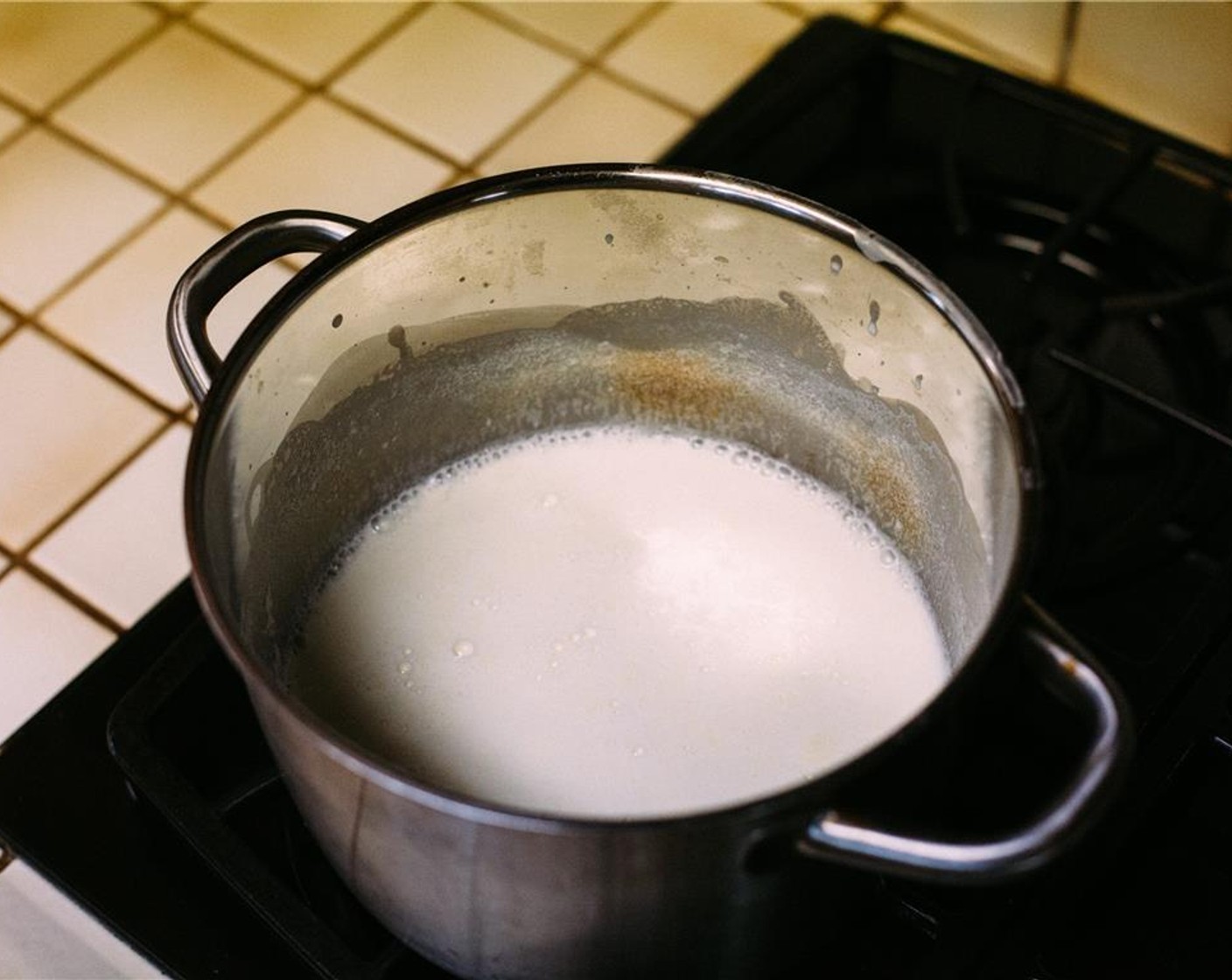 step 1 In a 4-quart saucepan, combine Milk (2 cups), Heavy Cream (2 cups), and half of the Granulated Sugar (1 1/4 cups). Set over high heat, and cook, stirring occasionally, until mixture comes to a boil, about 5 minutes.