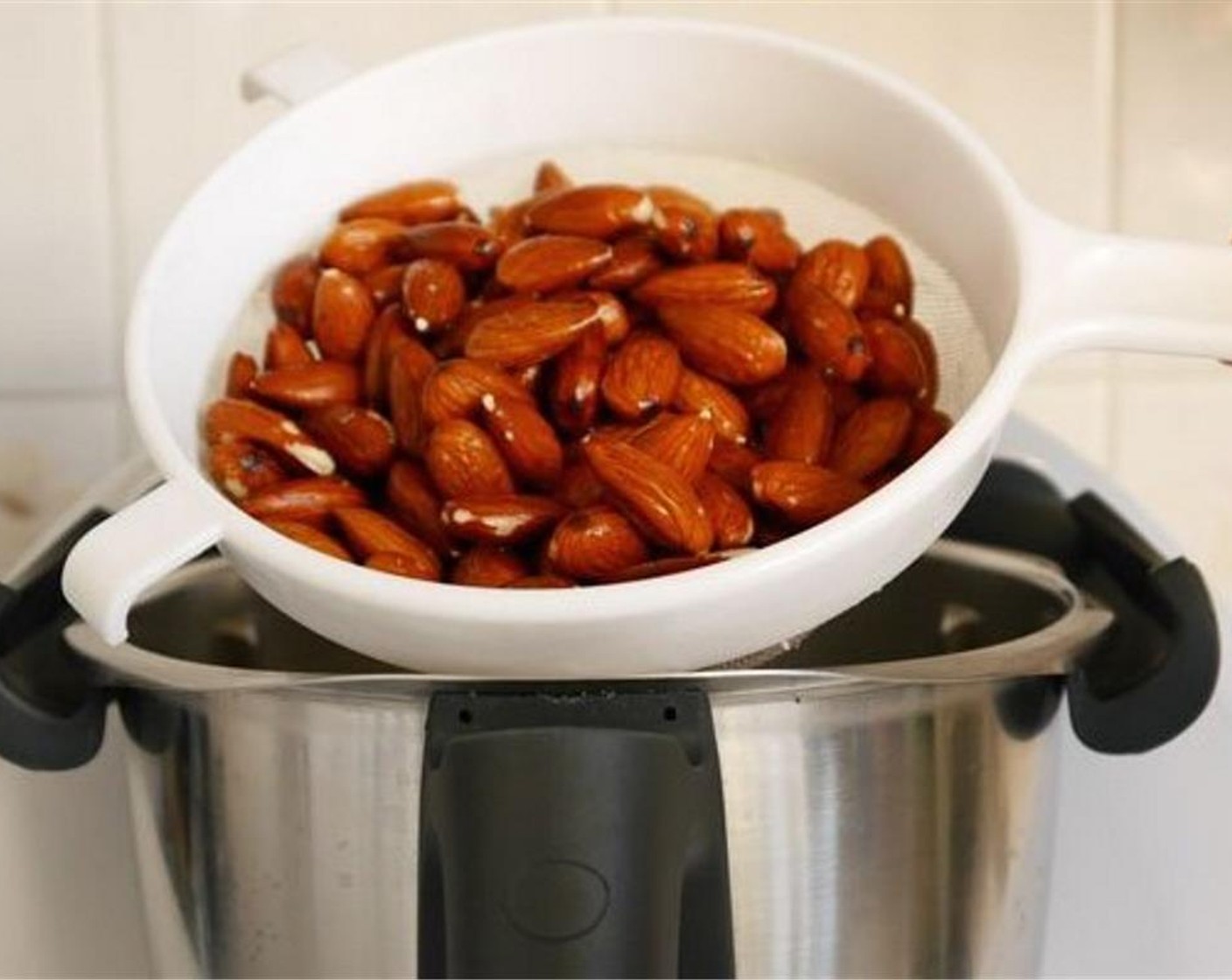 step 2 Next day drain the almonds and place them in a blender of food processor with the Water (3 cups), Vanilla Extract (1/4 tsp), and Medjool Dates (3).