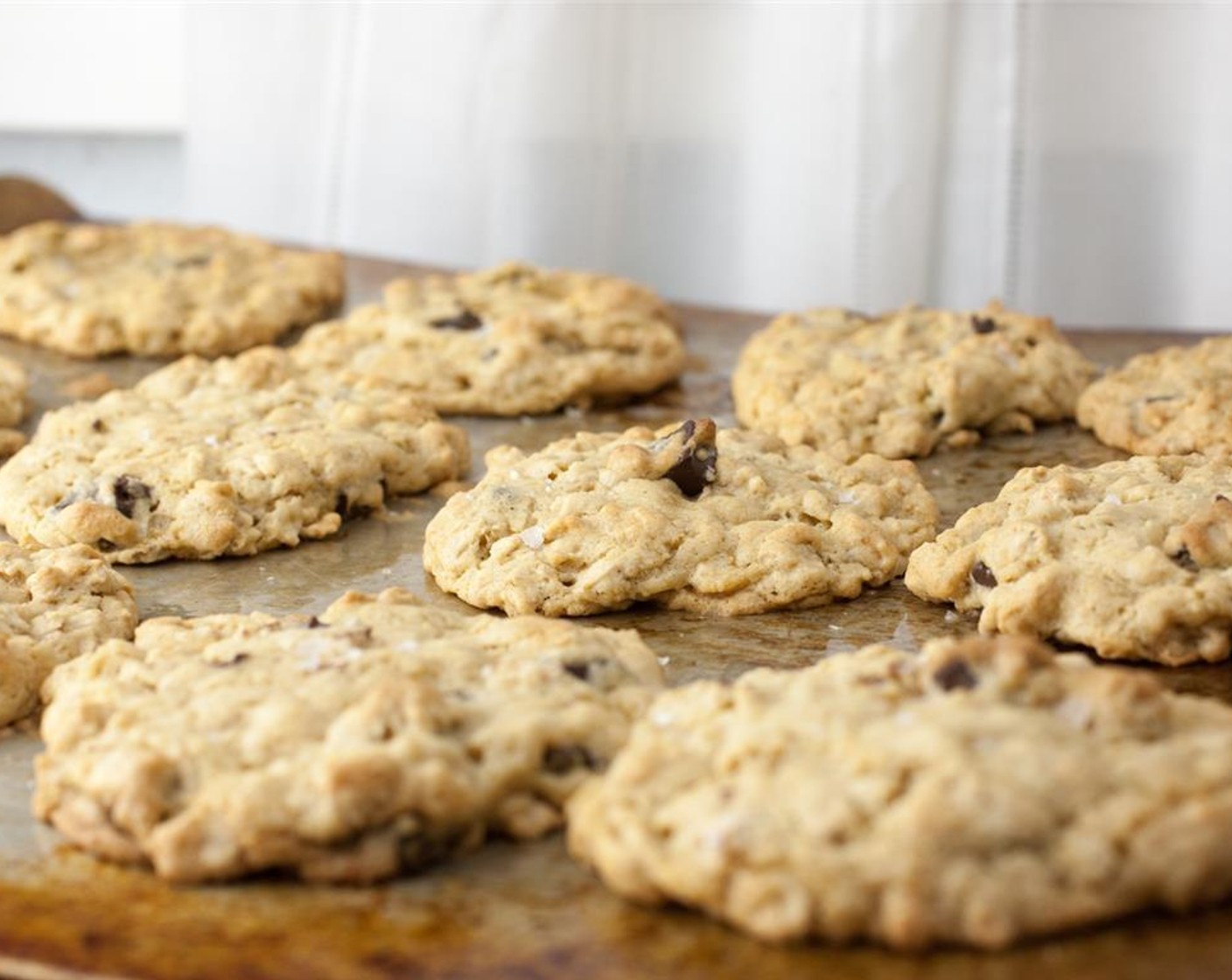 step 8 Remove from the oven and immediately sprinkle with Finishing Salt (to taste). Allow them to rest a couple minutes on the baking sheet before placing on a cooling rack. Repeat with remaining dough.