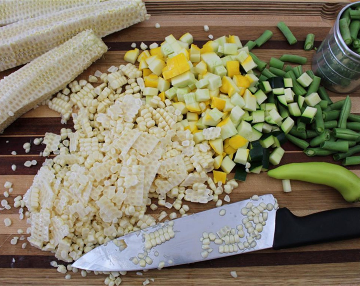 step 1 Cut the Green Beans (2 cups) into one-inch pieces. Shuck and slice the kernels from the Corn (3 ears). Chop the Summer Squash (2 cups). Mince the Garlic (2 cloves). If using, dice the Chili Pepper (1) and deseed if you like.