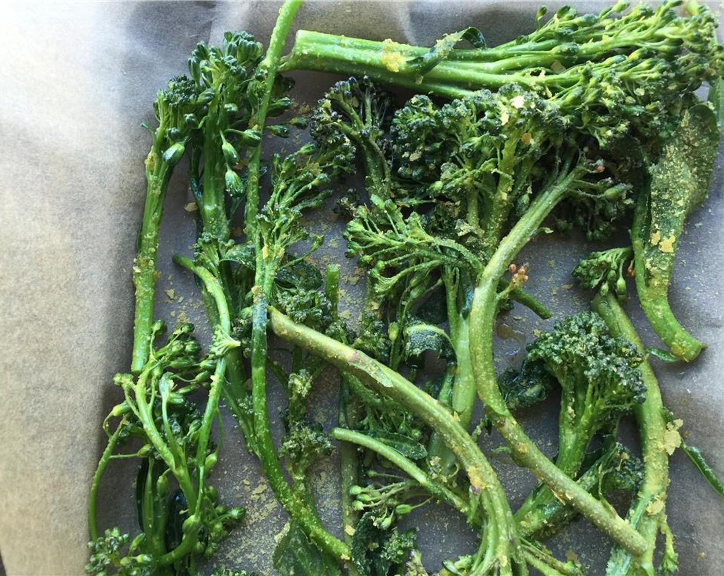 step 8 Toss the broccolini with Extra-Virgin Olive Oil (as needed) and plenty of Nutritional Yeast (to taste).