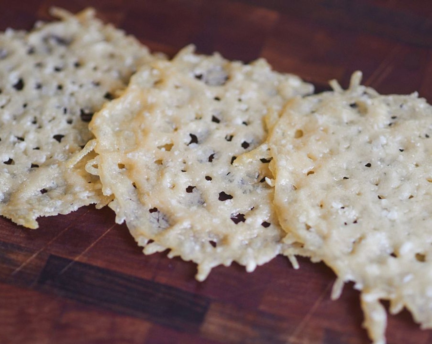 step 5 Parmesan crisps can be stored layered with wax paper in an airtight container at room temperature for three to five days.