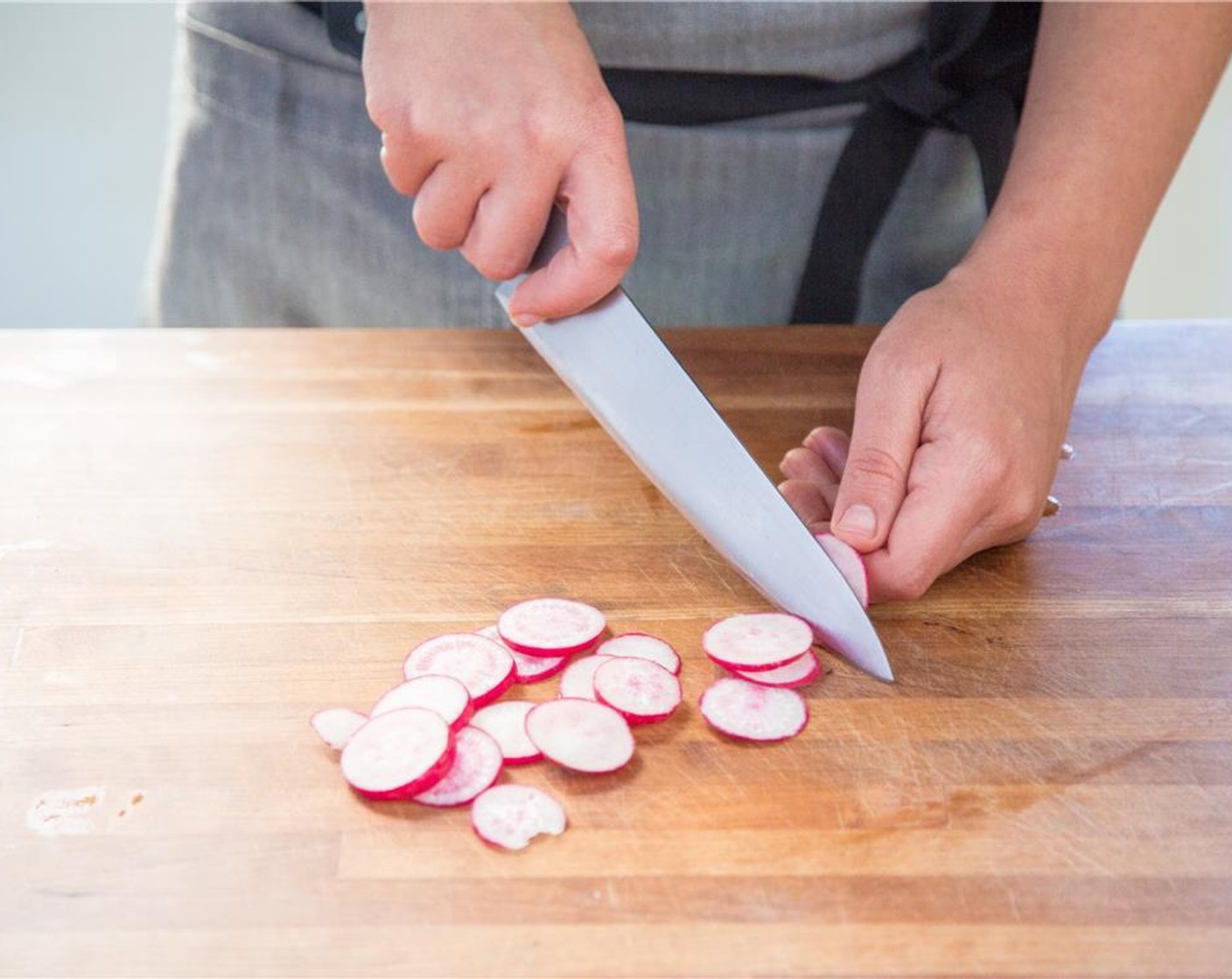step 5 Thinly slice the Radish (1 bunch) into 1/4-inch rounds and set aside.