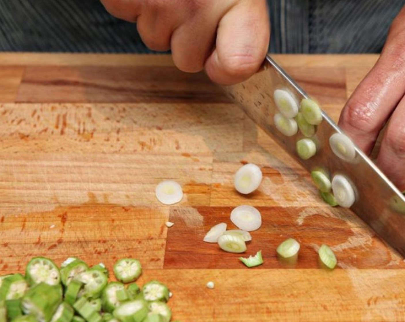 step 10 While the rice is cooking, wash and thinly slice the Okra (to taste) and Scallions (to taste). Add the okra to the gumbo and cook 3-4 minutes or until tender.