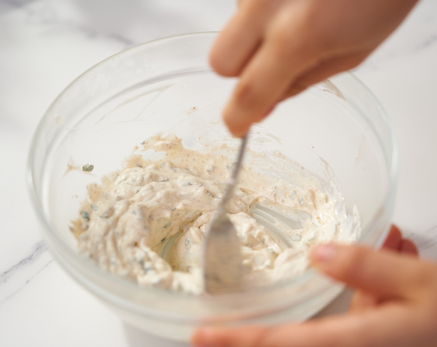 step 3 To make the Yogurt Sauce, in a medium bowl add Greek Yogurt (1/2 cup), Garlic (2 cloves), Fresh Mint (1 Tbsp), Ground Cumin (1/2 tsp), and 1 tsp of Lemon (1). Mix until well combined. Season with Salt (to taste) and Ground Black Pepper (to taste). Keep in the fridge until ready to serve.