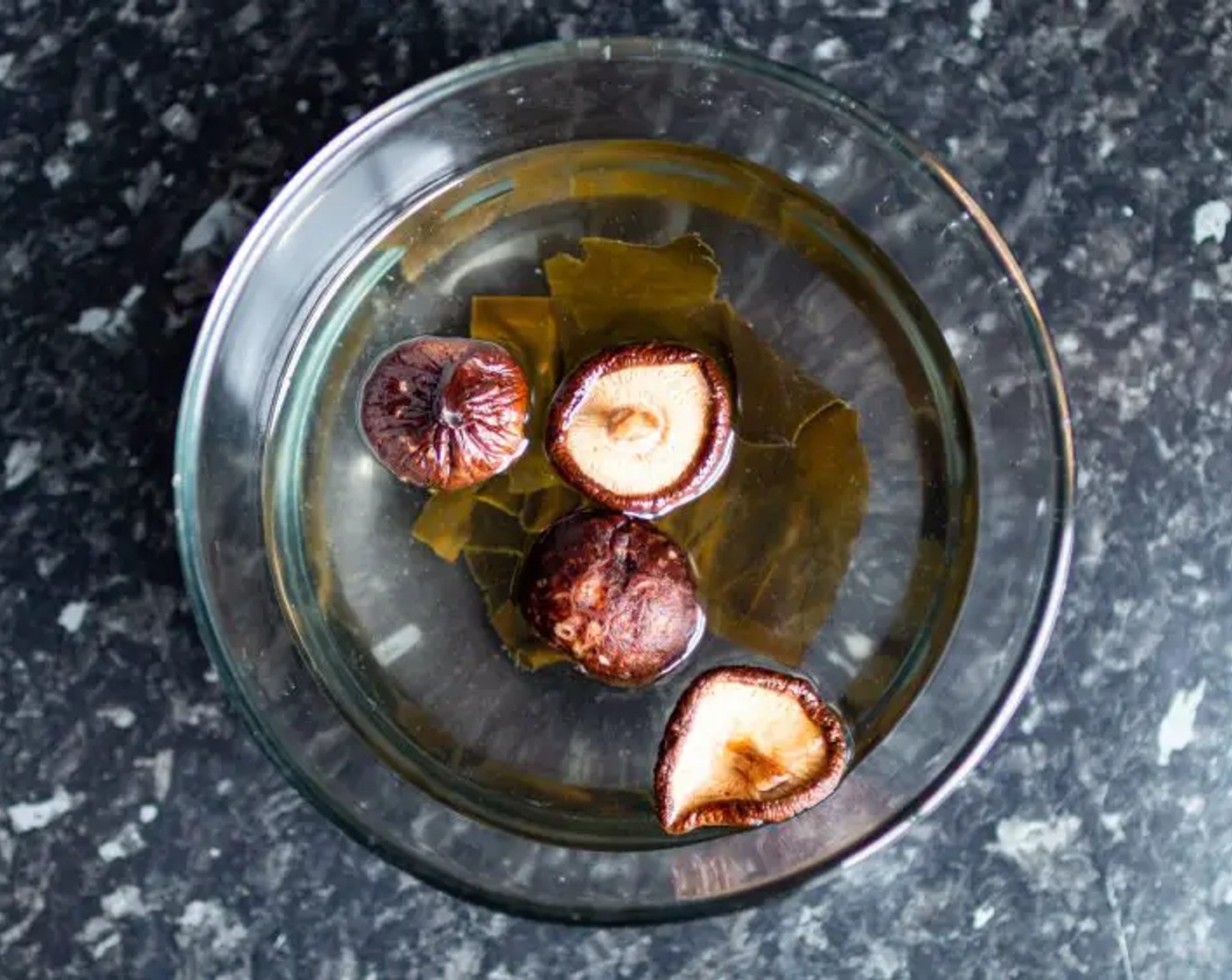 step 1 Soak the Kombu (1 Tbsp) and Dried Shiitake Mushrooms (1 1/2 Tbsp) in Water (3 cups) in a large container overnight (8 hours) or, for the best result 24 hours.