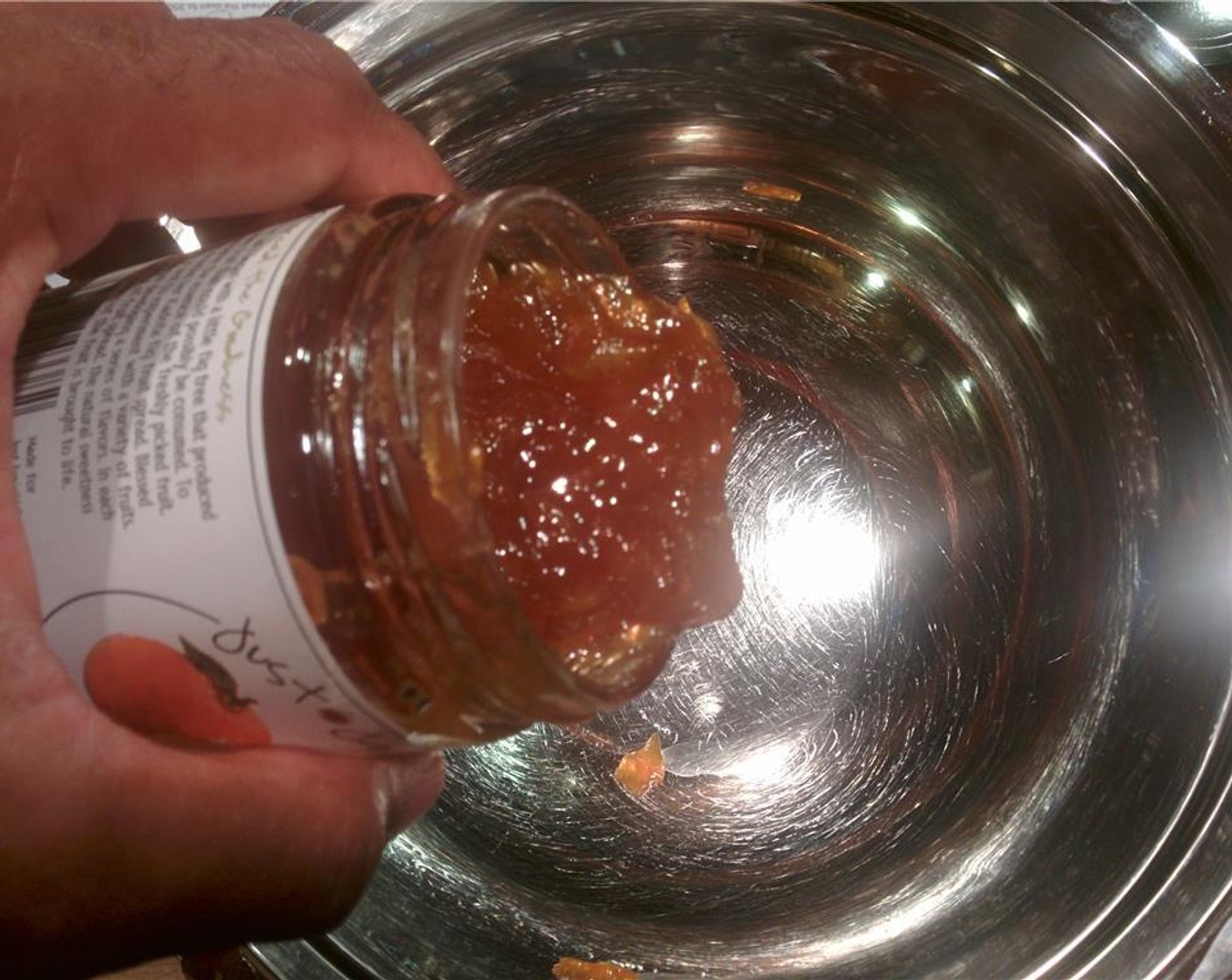 step 7 In a large bowl, combine Sriracha (2 Tbsp) and Just Jan’s® Tangerine Marmalade (1 Tbsp).