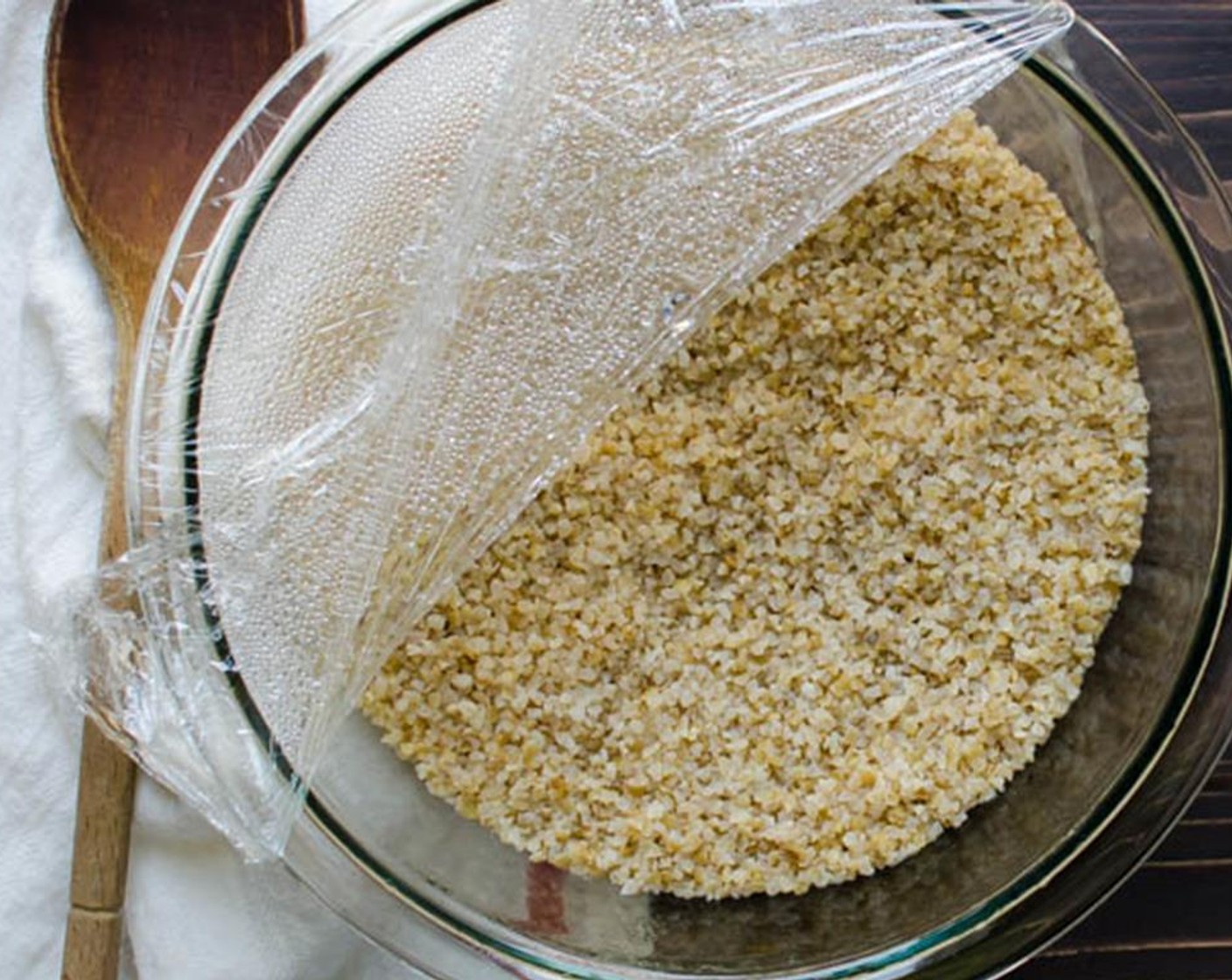 step 1 In a medium bowl add Bulgur Wheat (1 cup) and boiling Water (1 3/4 cups) and cover tightly with saran wrap. Set aside for 15-20 minutes for the wheat to absorb the liquid.