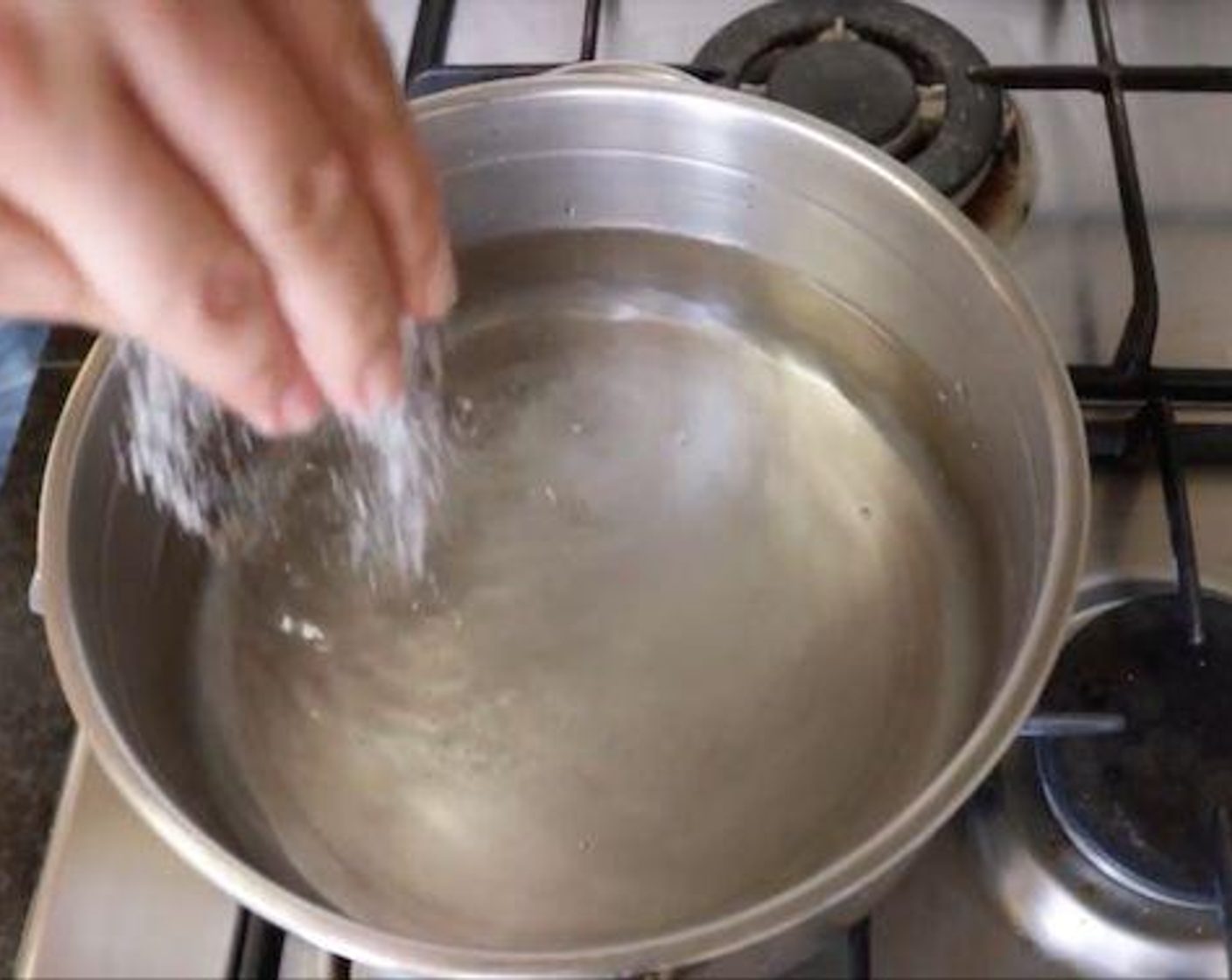 step 6 Fill a stock pot 1/2 way with water, season generously with salt, add a drizzle of extra virgin olive oil and heat it with a high heat.